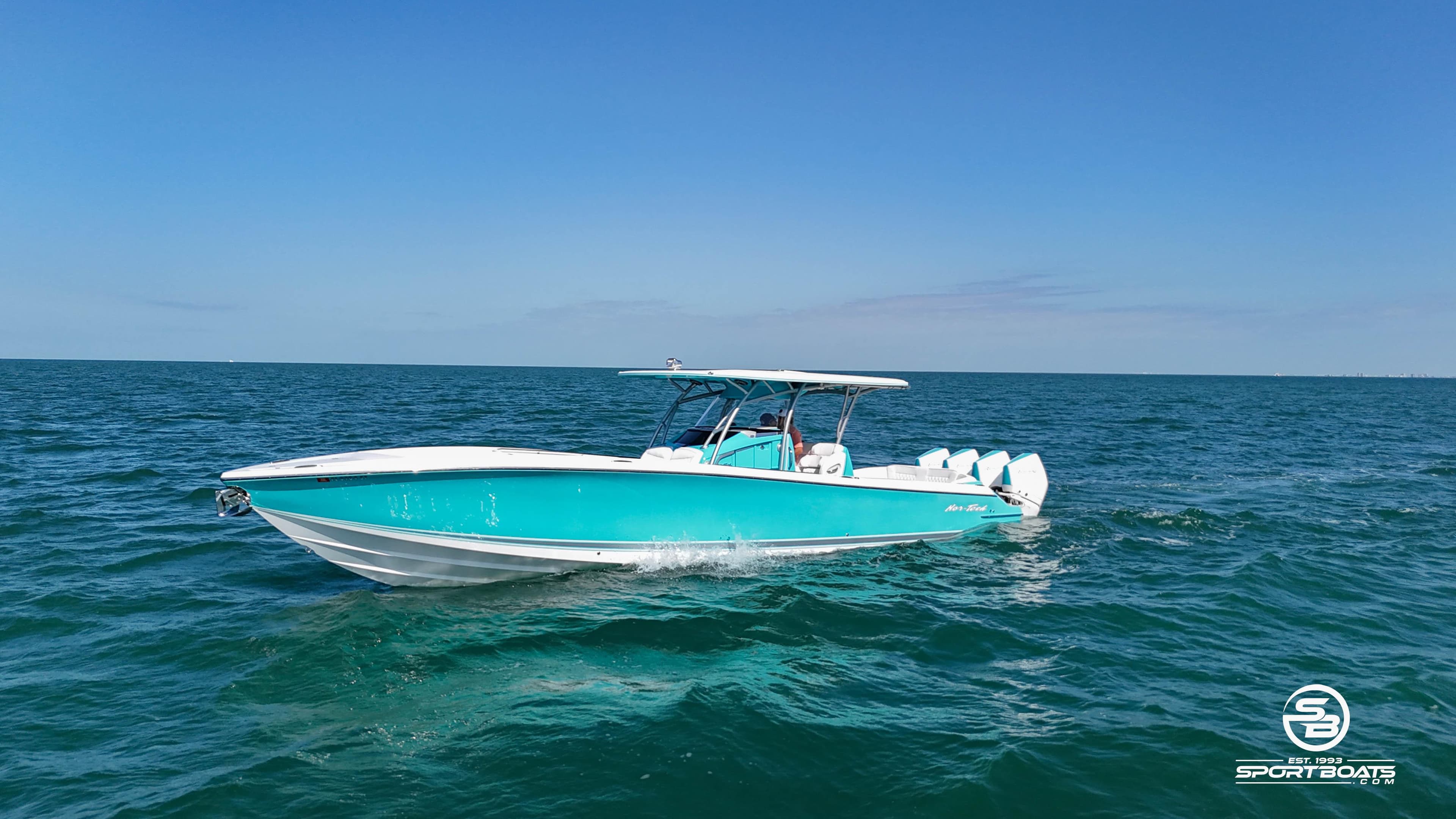 2020 Nor-Tech 390 Sport boat cruising on open water.