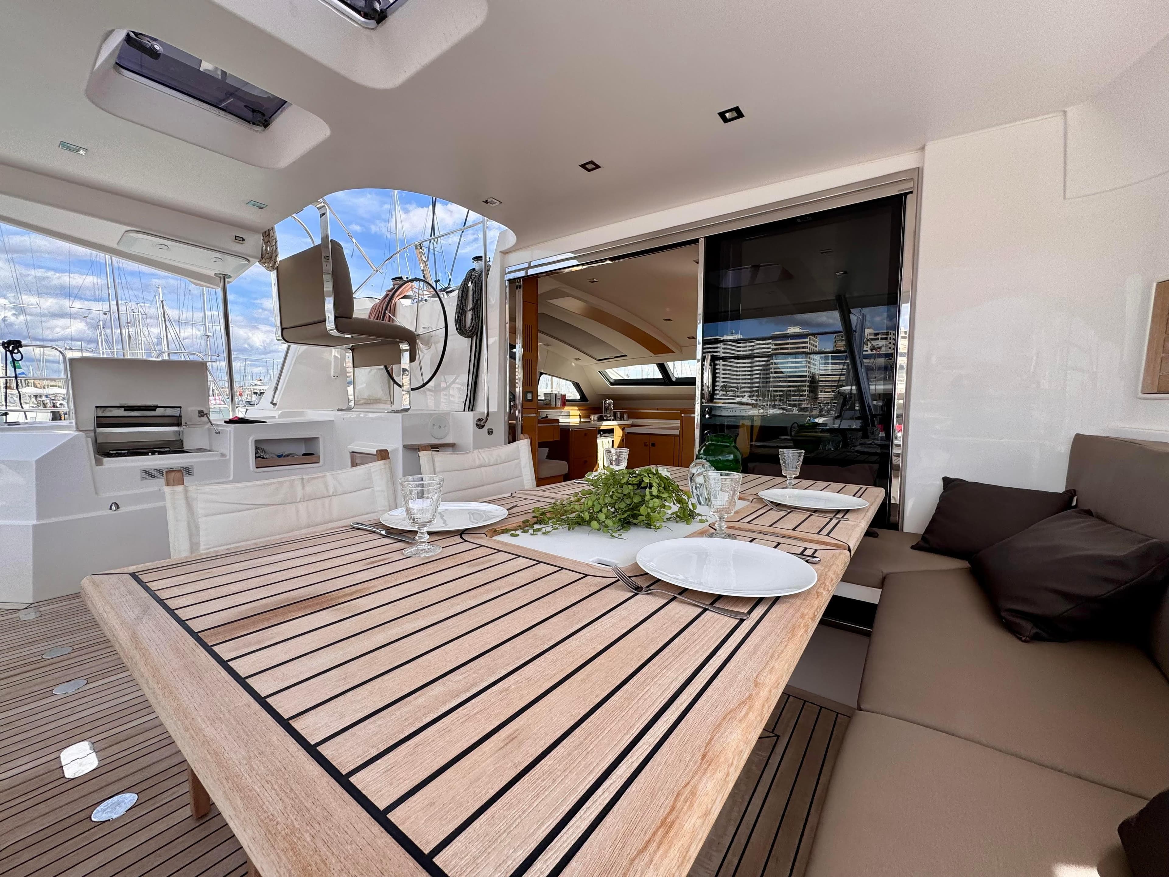 Luxurious dining area on a 2016 Privilege Serie 5 yacht.