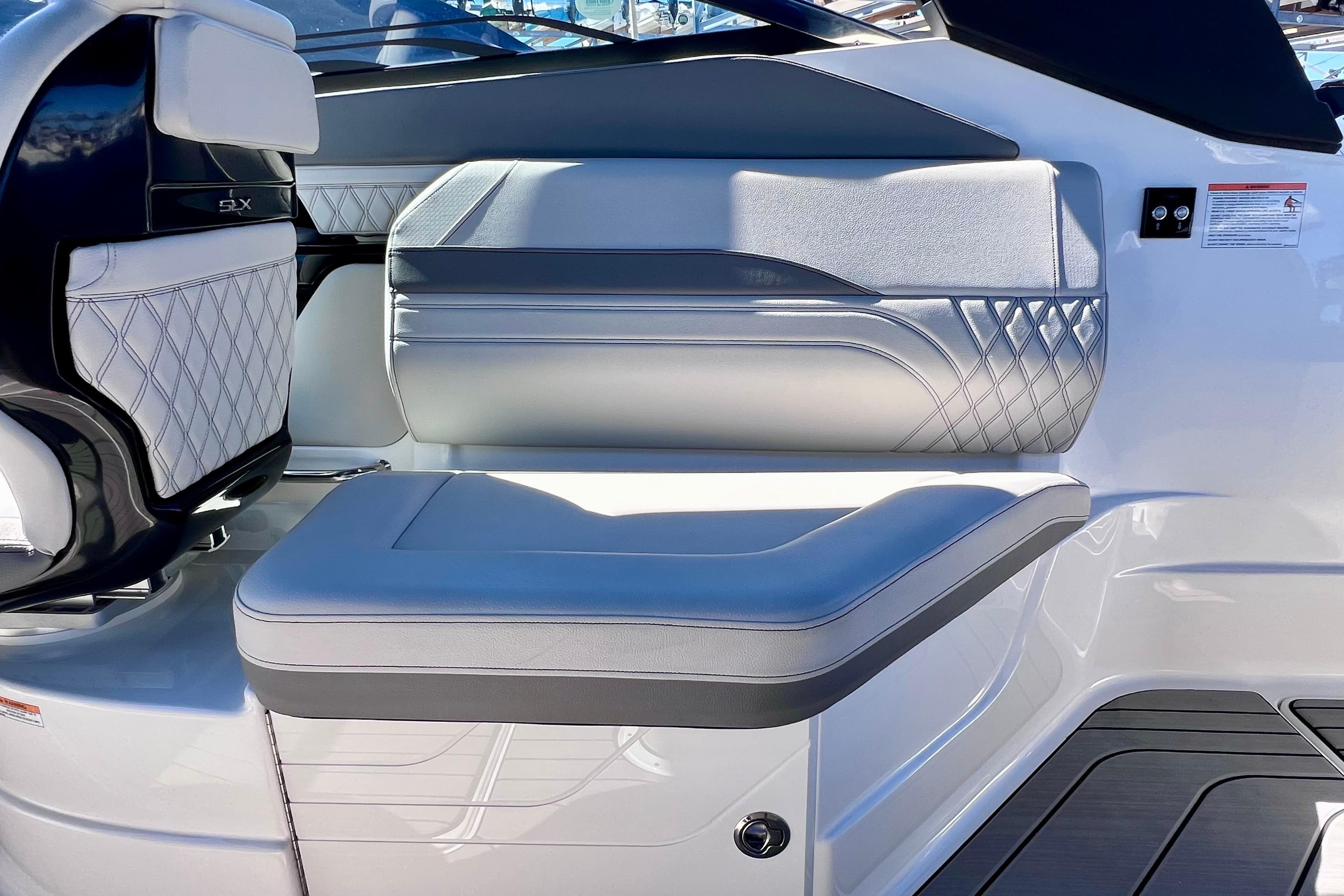 2024 Sea Ray SLX 260 Outboard interior seating with elegant design and premium materials.