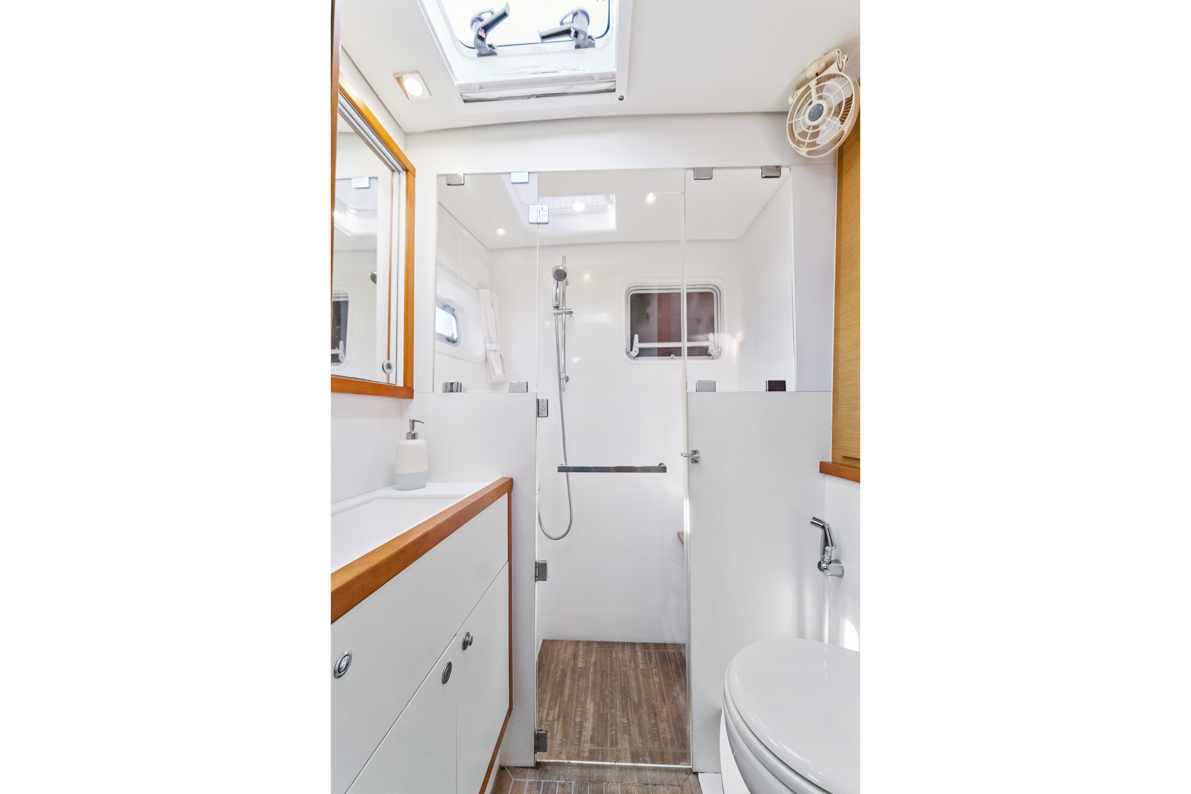 Luxurious bathroom in 2012 Lagoon 560 yacht with modern fixtures and elegant design.