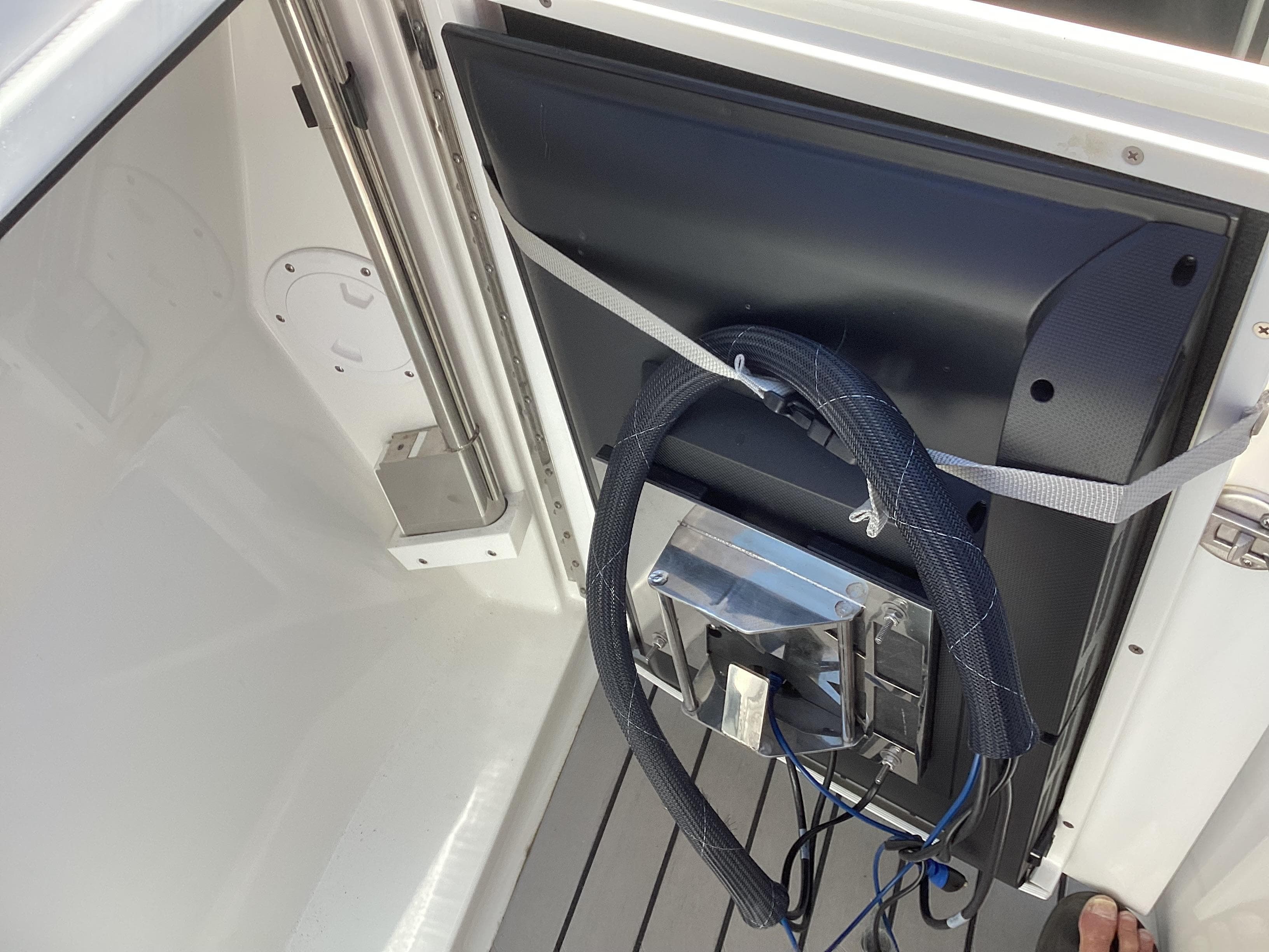 2020 Formula 380 Super Sport Crossover interior with mounted equipment and wiring.