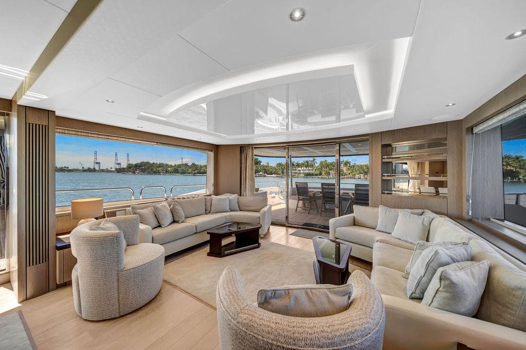 Luxurious interior of 2021 Sunseeker 86 Yacht with elegant seating and ocean view.
