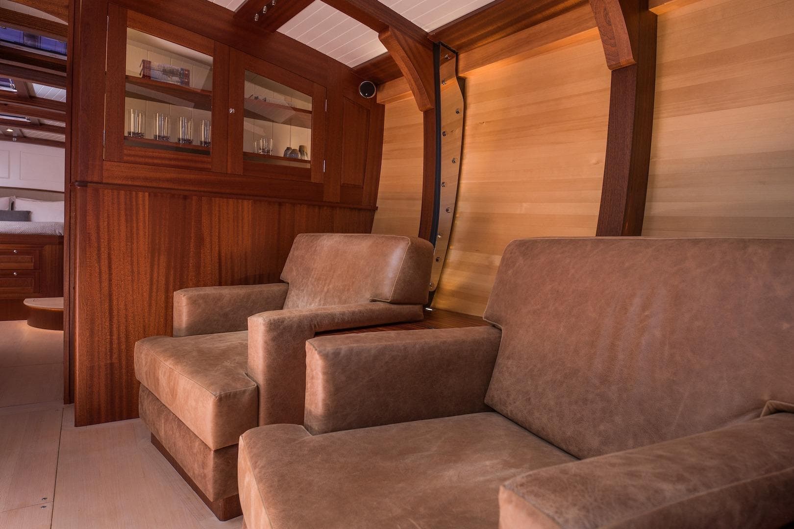 Luxurious interior of 2023 Spirit Yachts C72 with leather seating and wooden finishes.