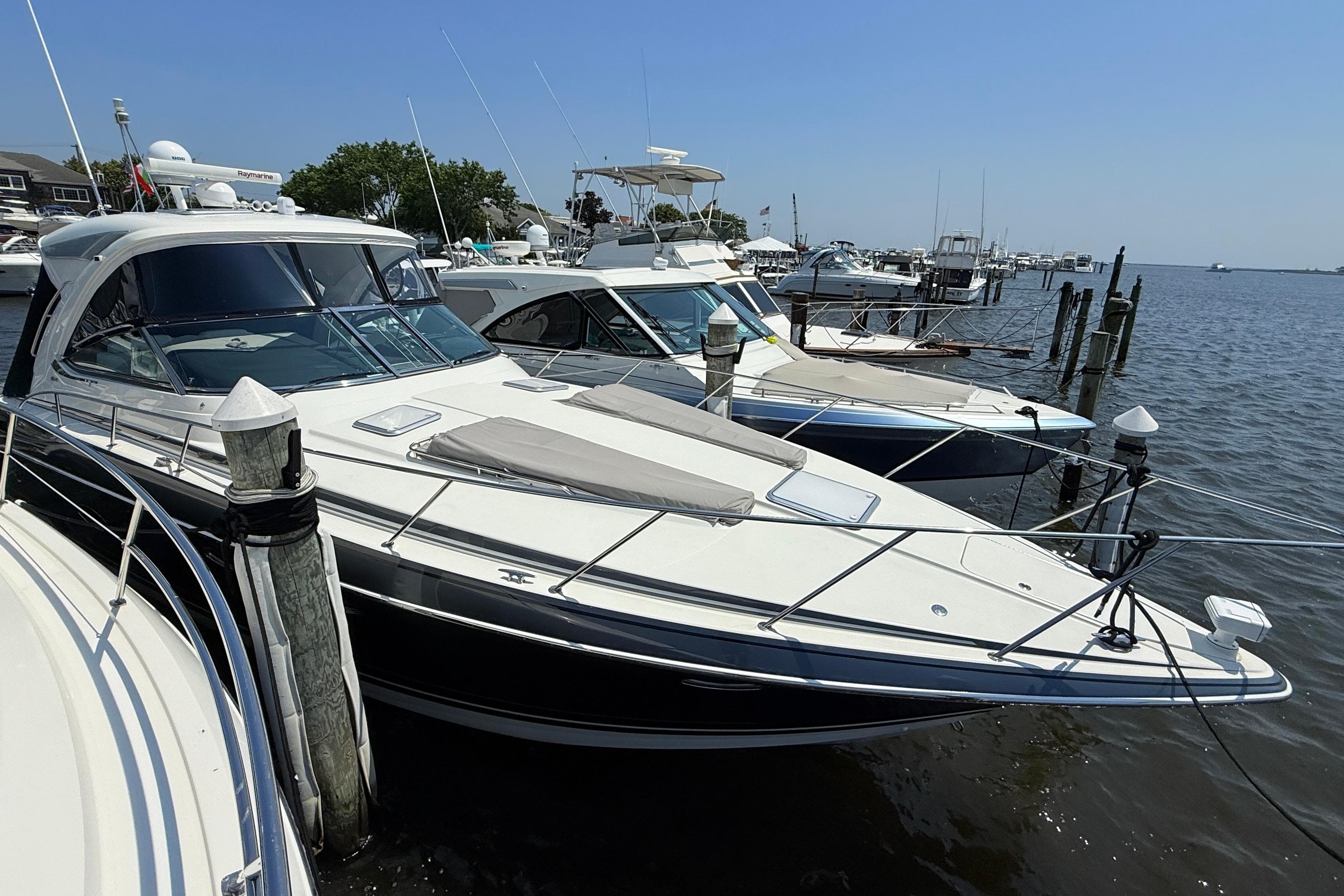 2022 Formula 40 Performance Cruiser docked at a marina on a sunny day.