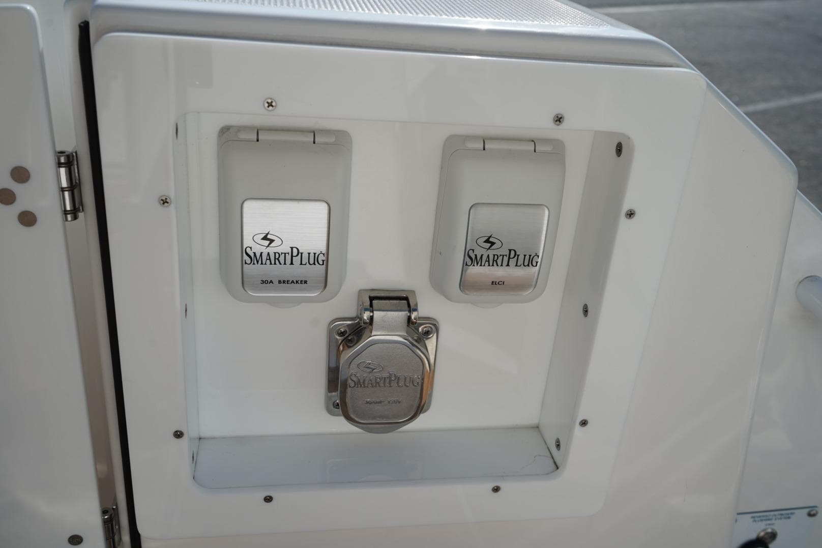 2024 Edgewater 285CC boat featuring SmartPlug electrical outlets for enhanced safety and convenience.