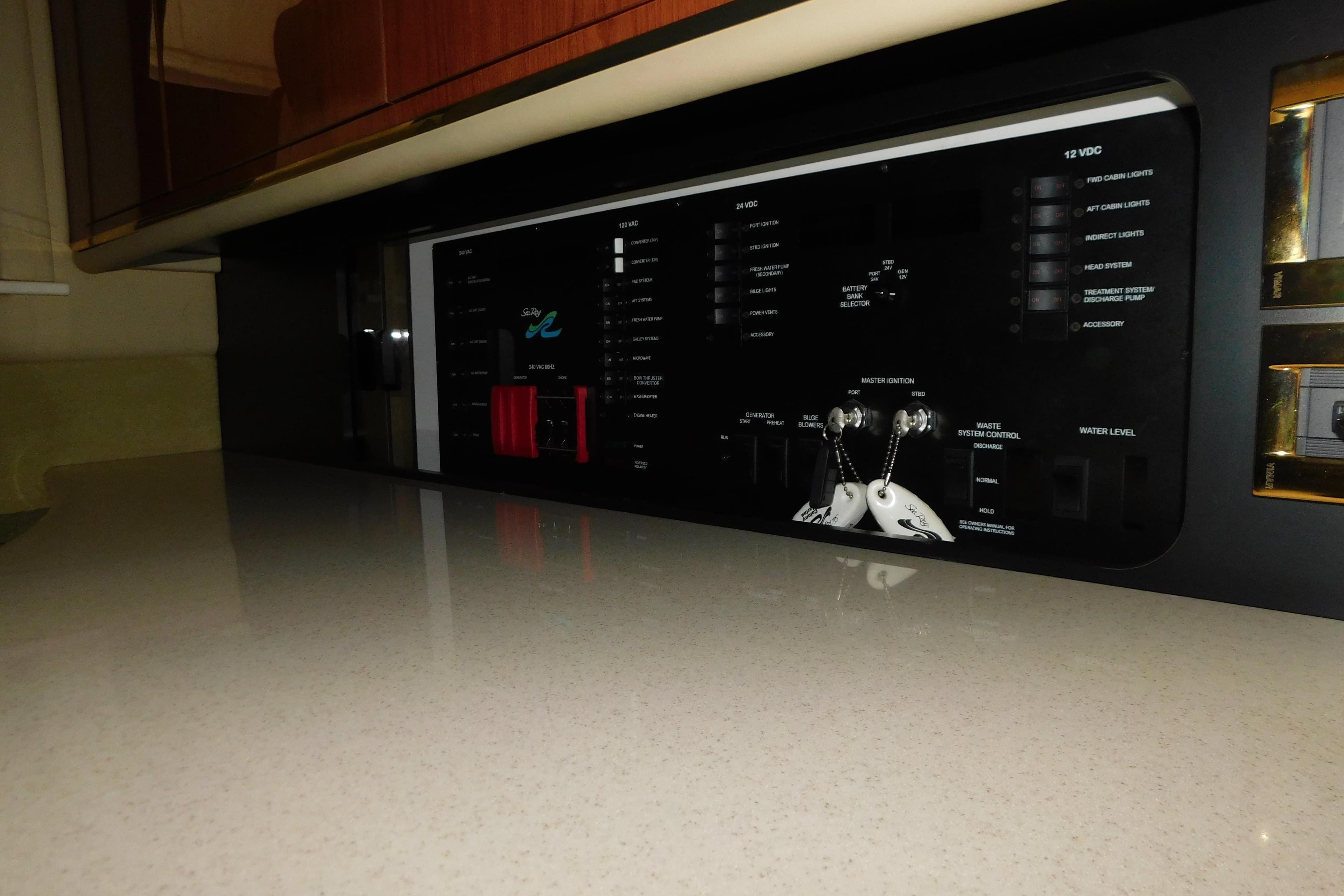 Control panel of a 1999 Sea Ray 500 Sundancer yacht interior.