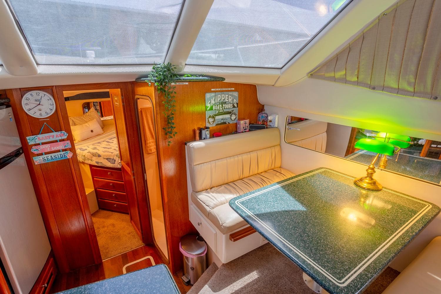 Interior of 2000 Carver 356 Aft Cabin Motor Yacht with cozy dining area.