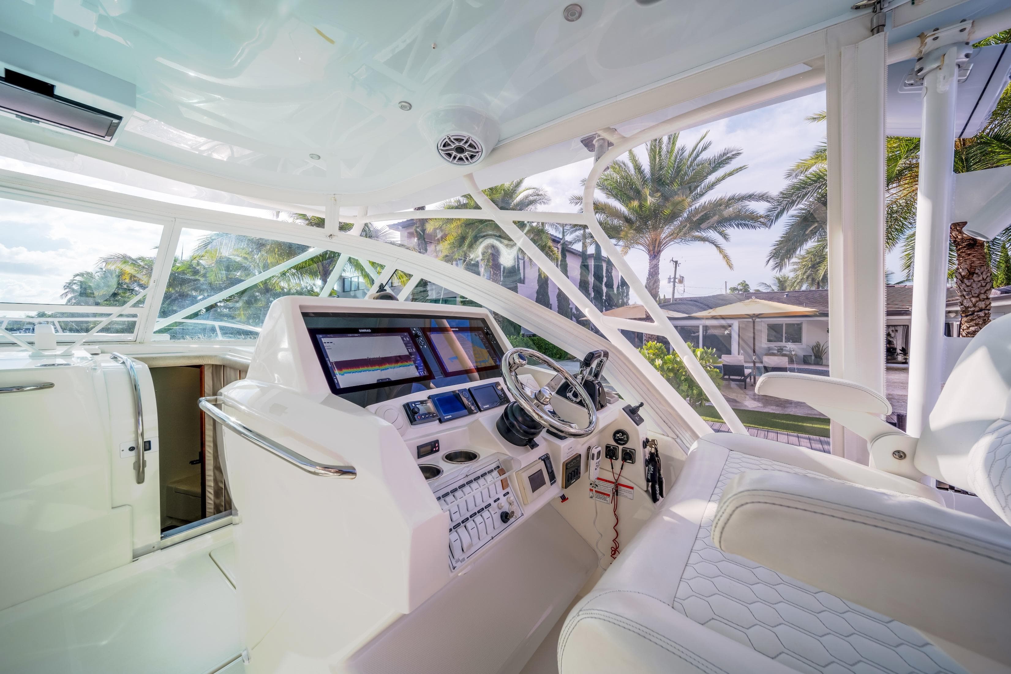 2011 SeaVee 430 Sport Express helm with modern controls and panoramic view.