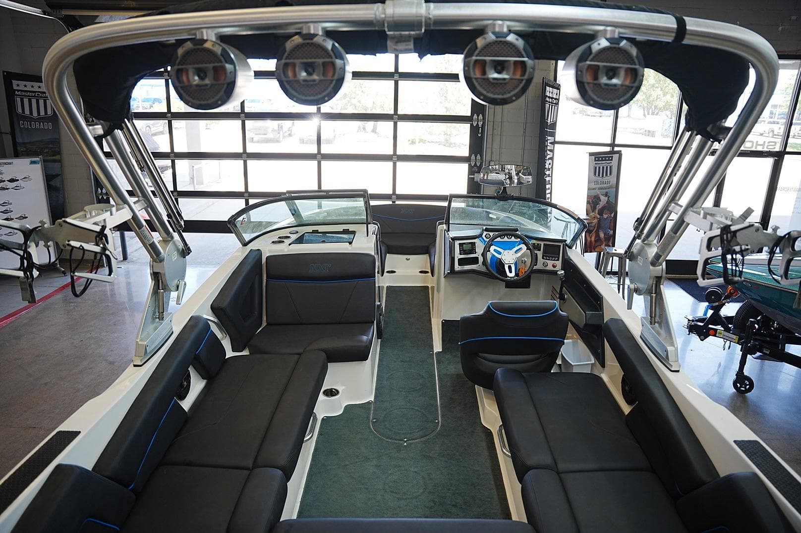 2019 MasterCraft NXT22 boat interior with sleek seating and advanced dashboard.
