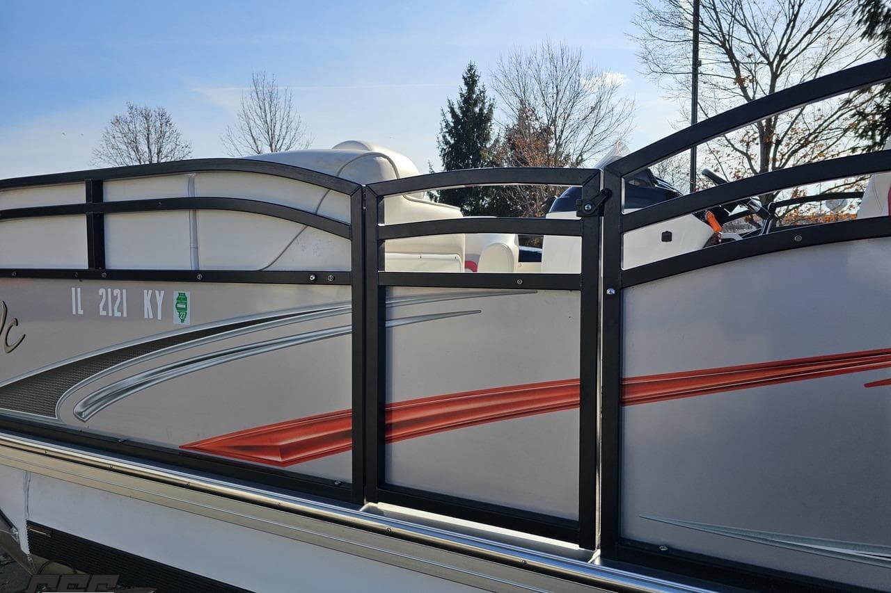 2019 JC Tritoon Neptoon 25 Sport SL pontoon boat with sleek design and vibrant accents.