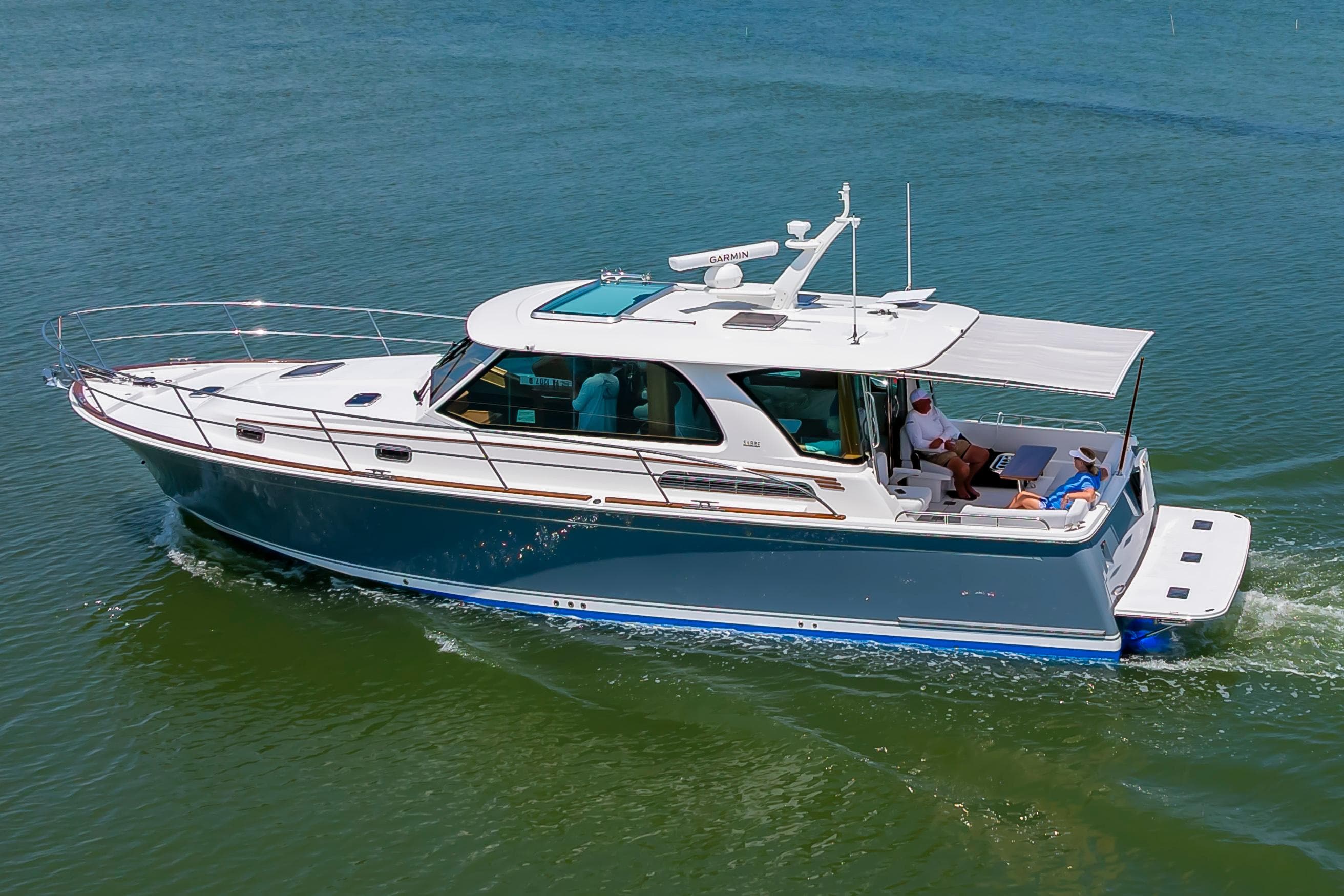 2026 Sabre 43 Salon Express yacht cruising on calm waters.