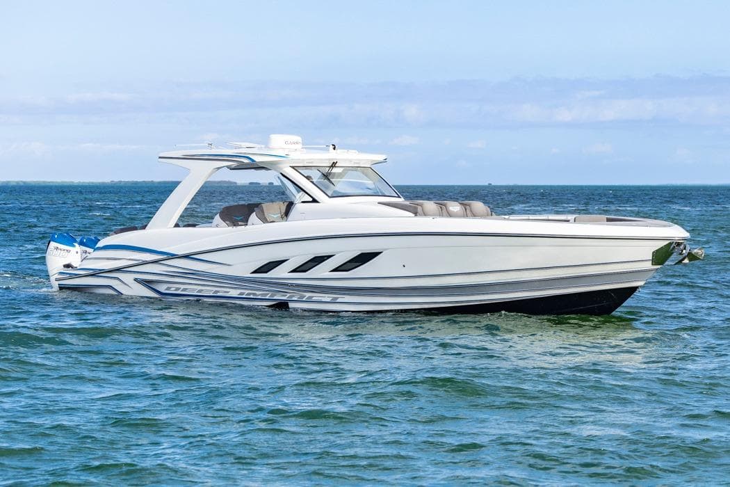 2025 Deep Impact 499 Sport boat cruising on open water.
