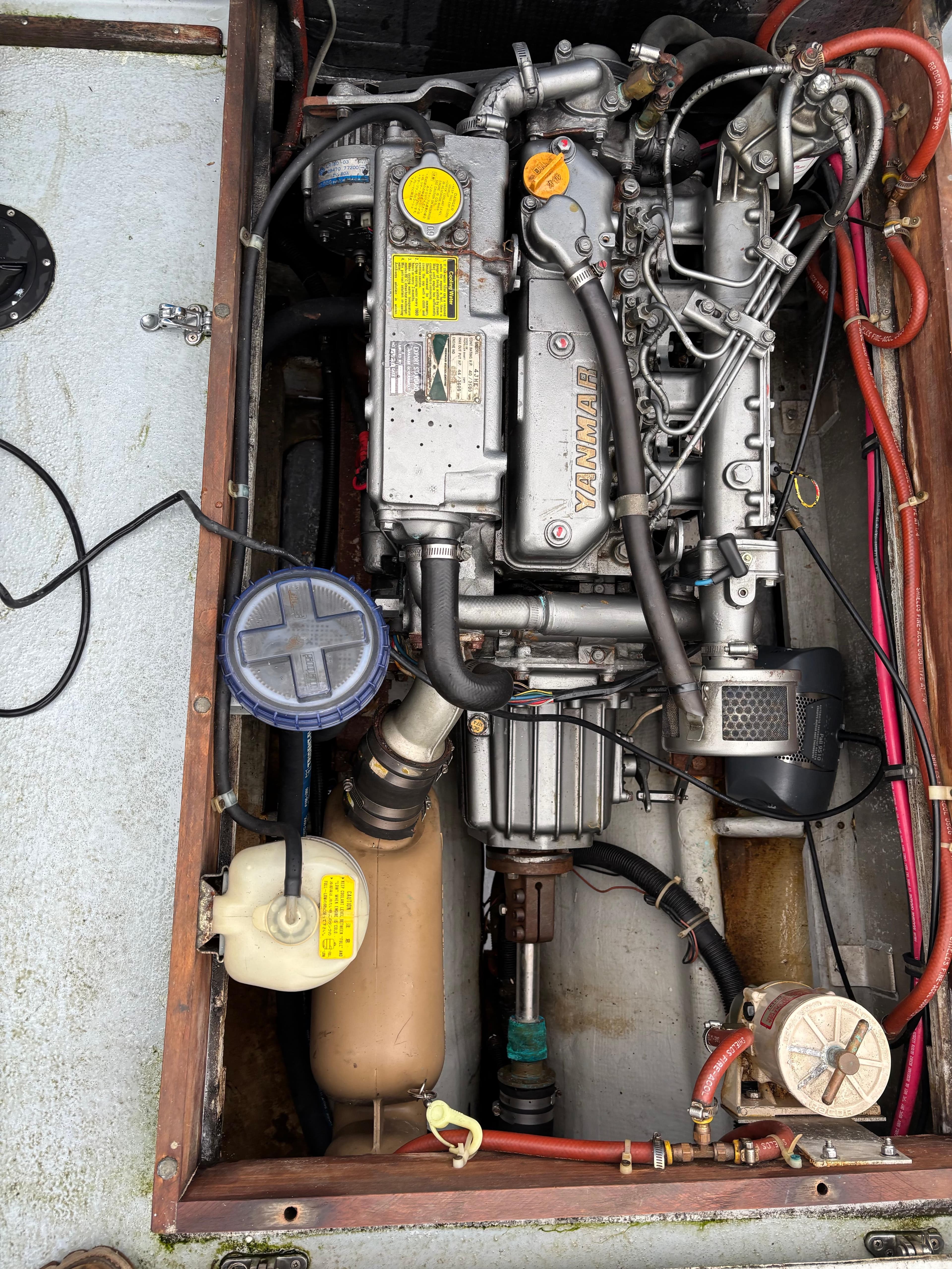 Engine compartment of a 1990 Target 22 model with visible components and wiring.