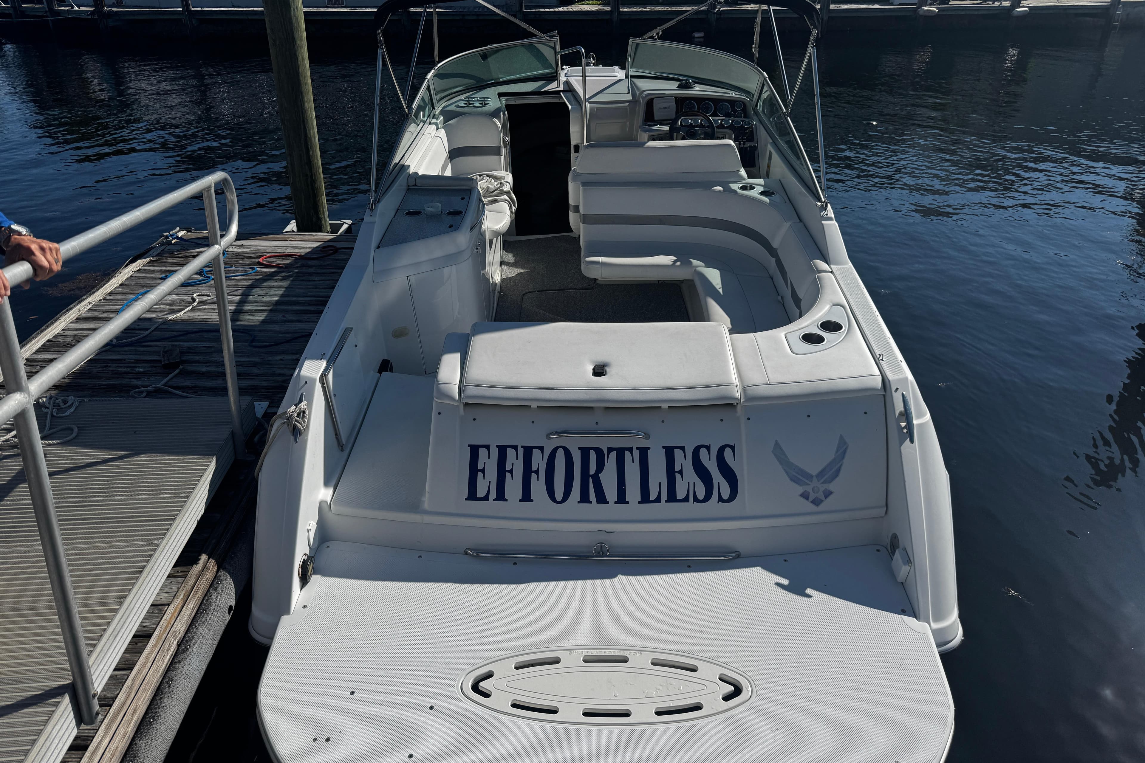 2004 Formula 280 Sun Sport boat named "Effortless" docked at a marina.