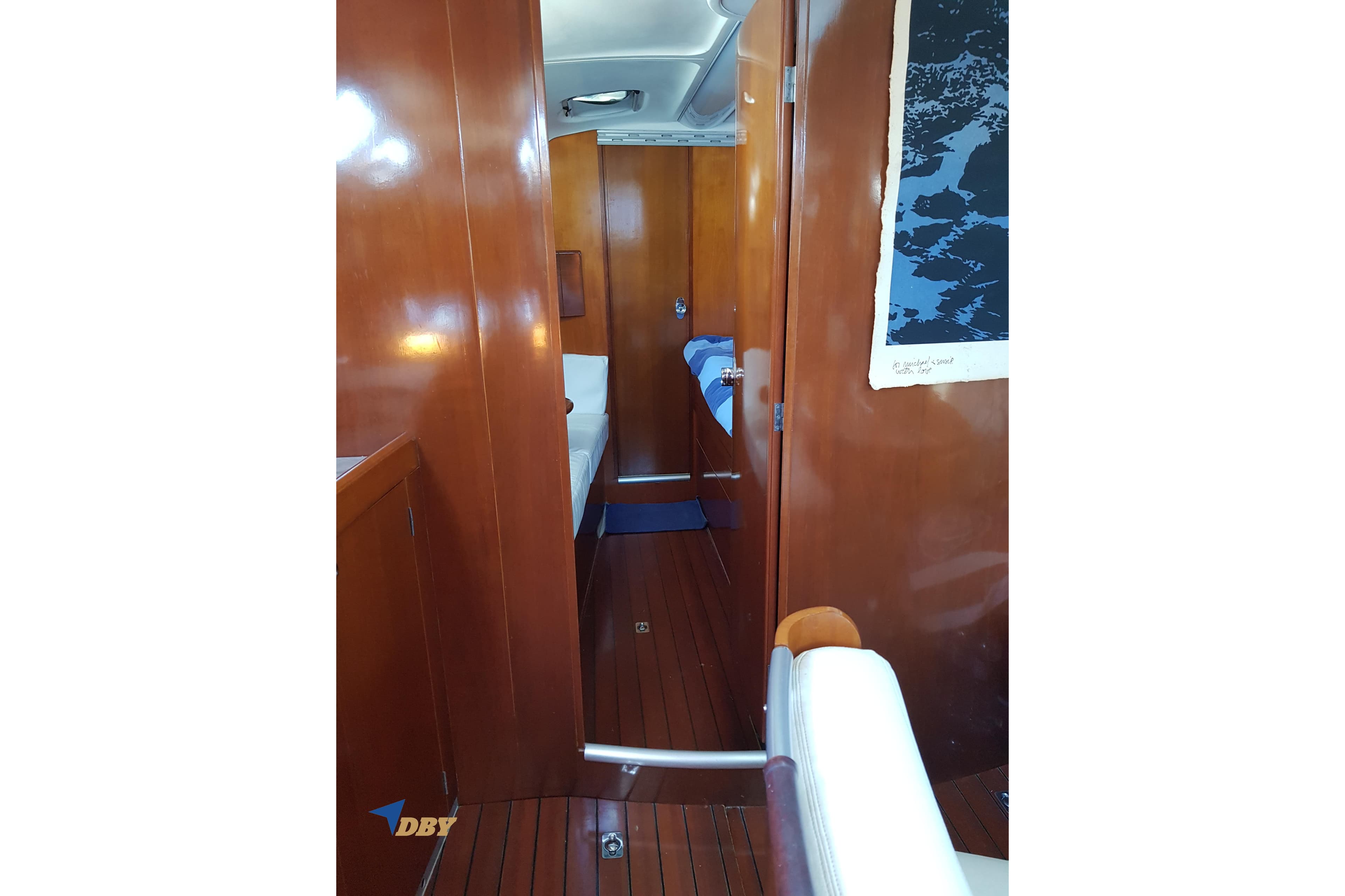 Interior view of 1993 Beneteau First 45f5 yacht with wooden finish.