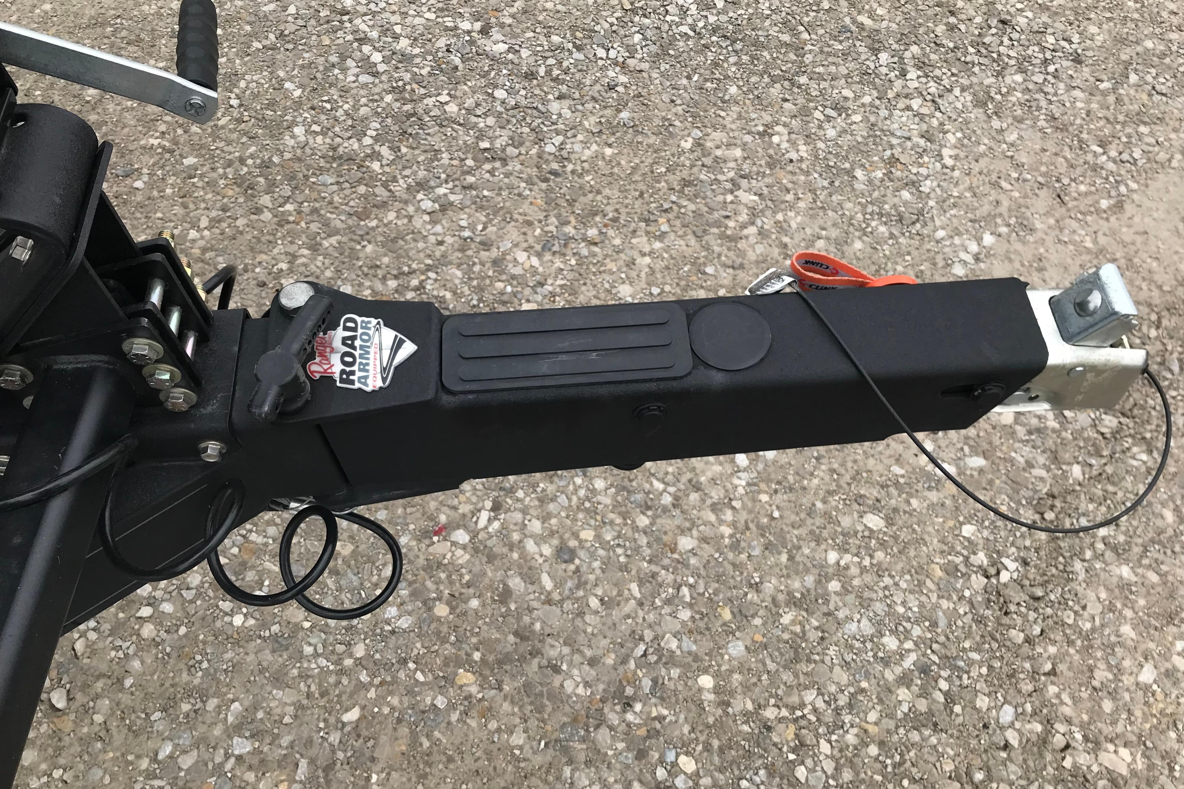 Trailer hitch of a 2022 Ranger Z185 on gravel surface.