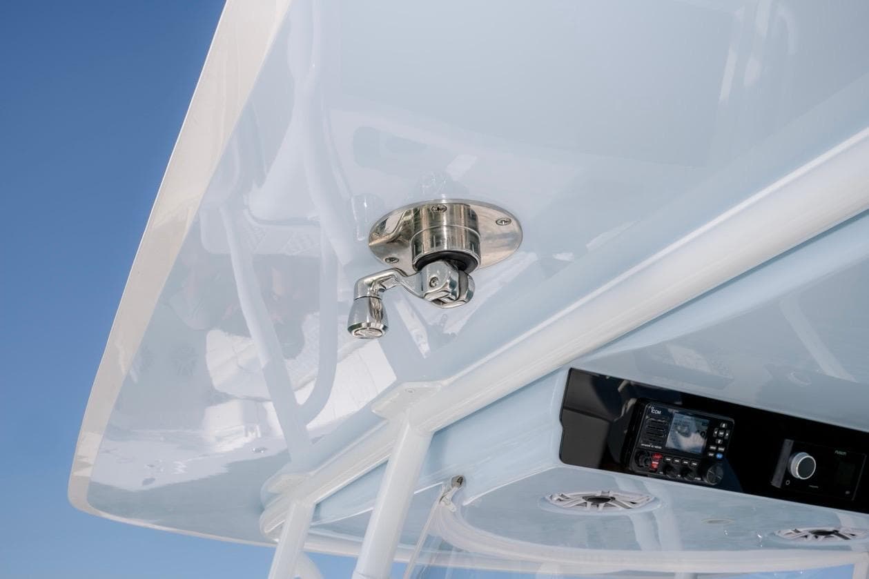 2026 Contender 39 ST boat detail showing stainless steel fitting and electronic controls.