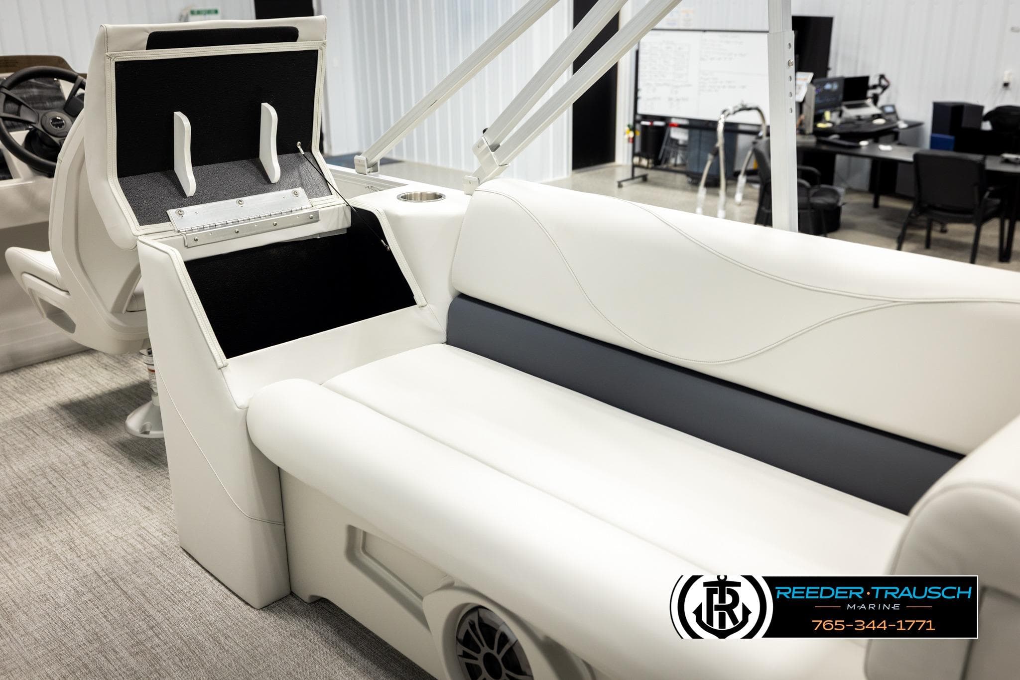 Luxurious interior of 2026 Avalon VLS QL boat with white seating and modern design.