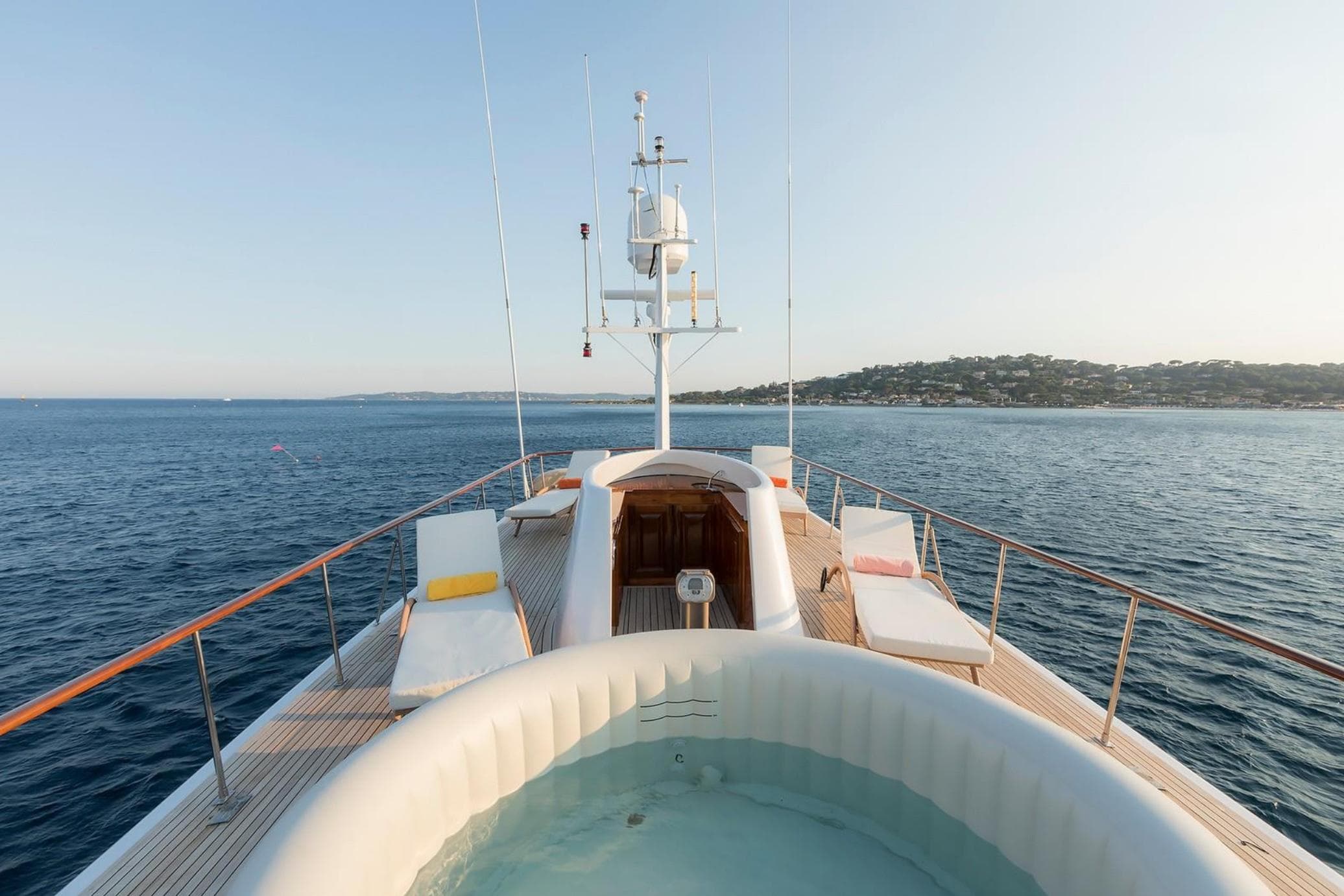 Luxury yacht "Le Kir Royal" by Van den Akker, 1966, with deck jacuzzi and ocean view.