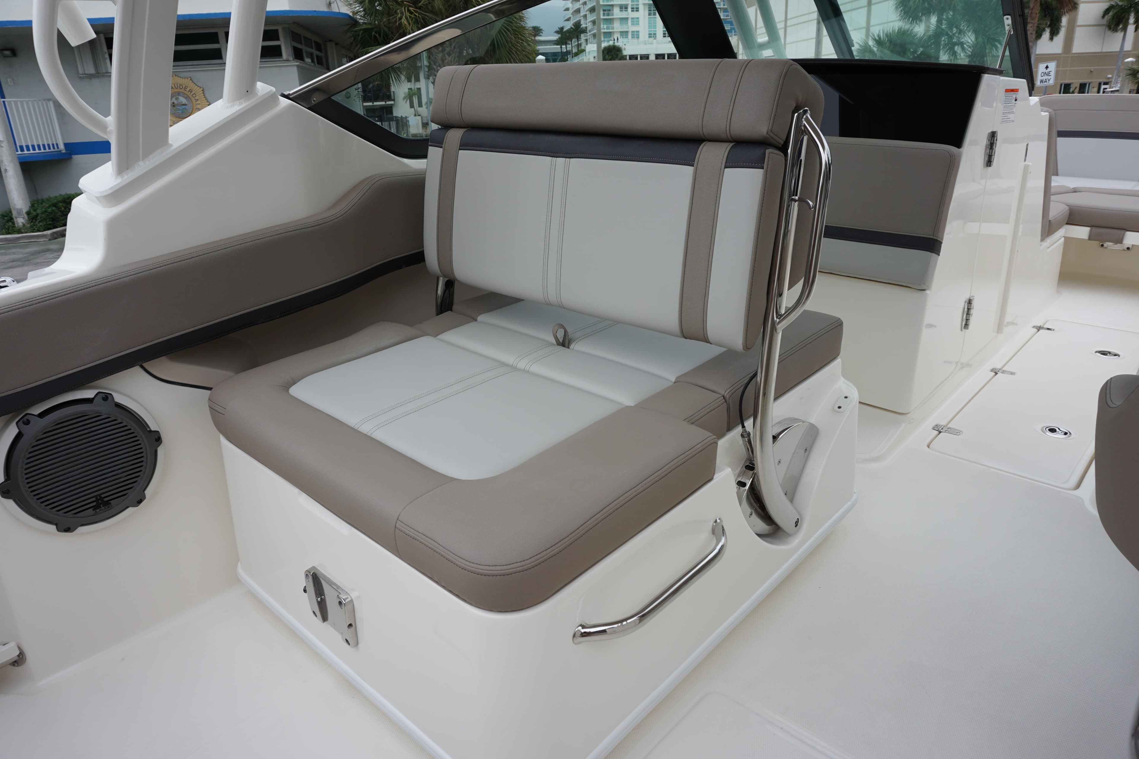 2026 Boston Whaler 240 Vantage boat interior with cushioned seating and sleek design.