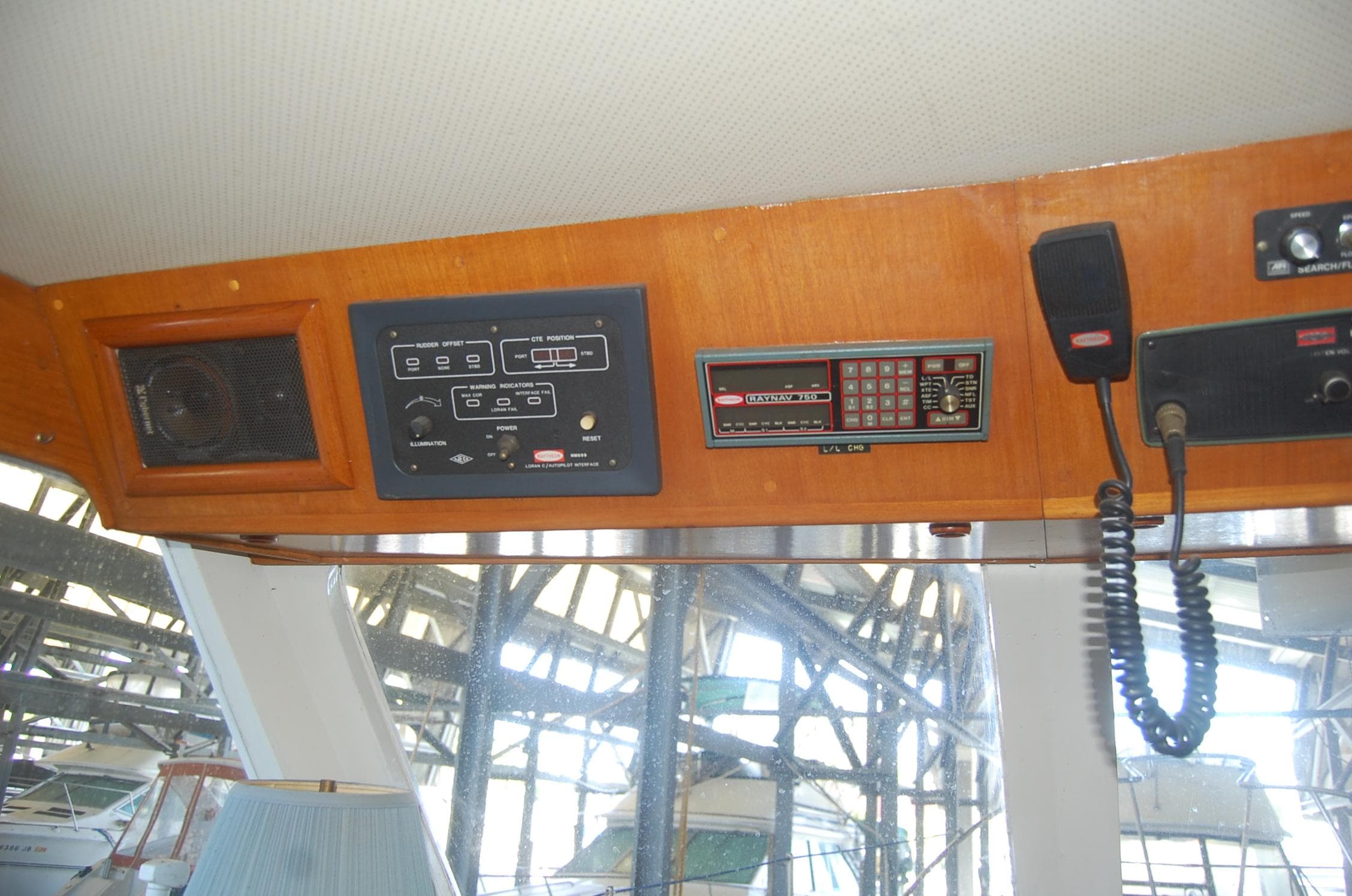 Control panel of 1983 Island Gypsy 36 Quad Cabin with radio and speaker.