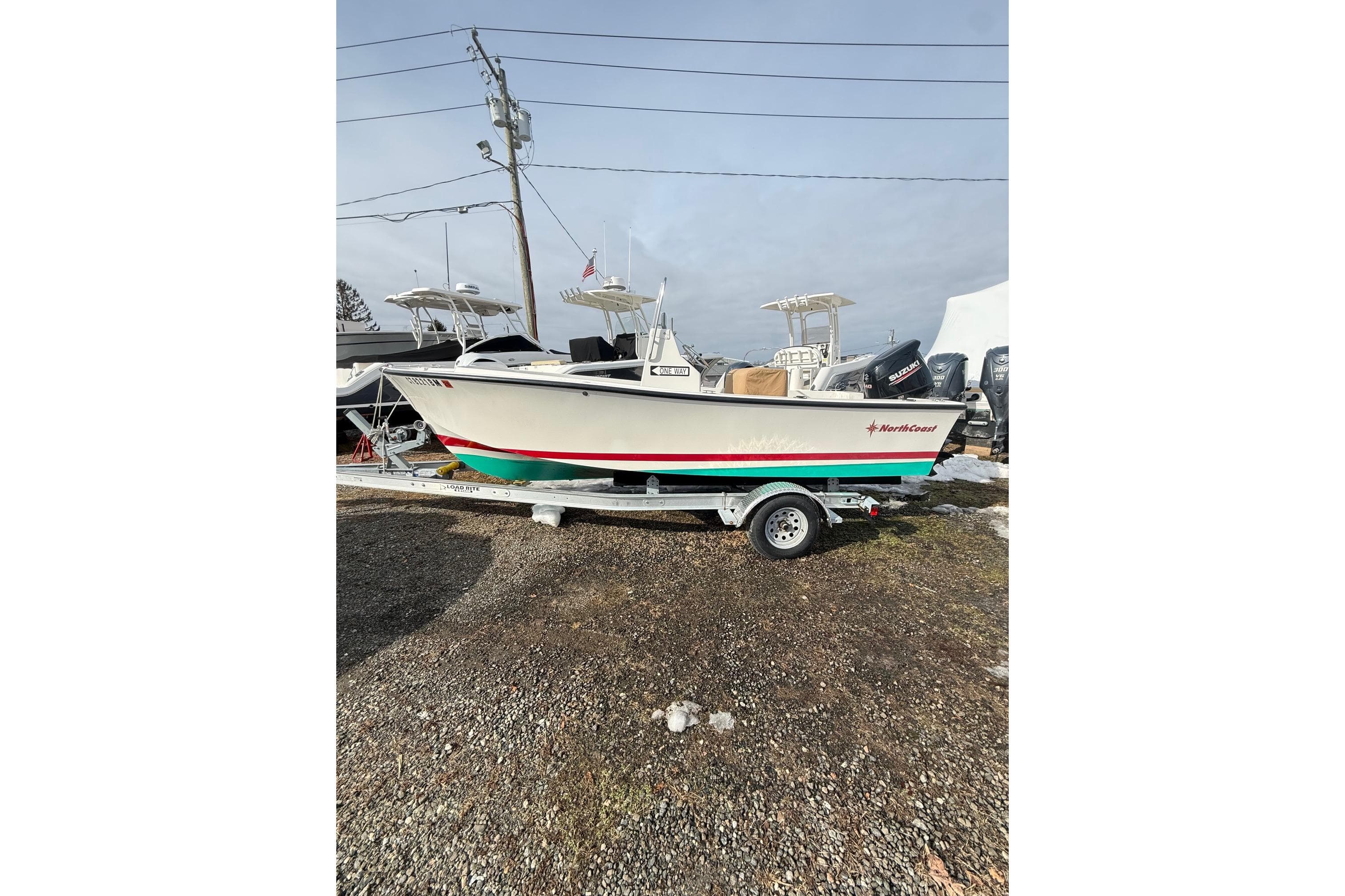 2018 NorthCoast 190 Center Console boat on trailer, parked outdoors.
