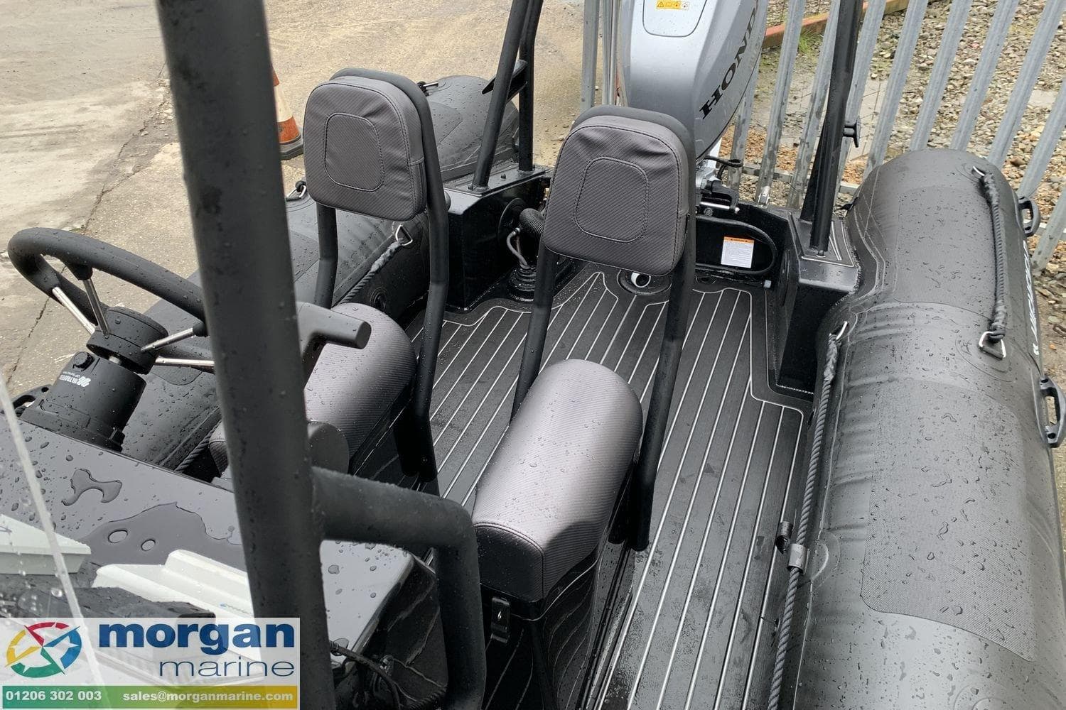 2023 Highfield Patrol 500 boat interior with wet seats and Honda engine, displayed by Morgan Marine.