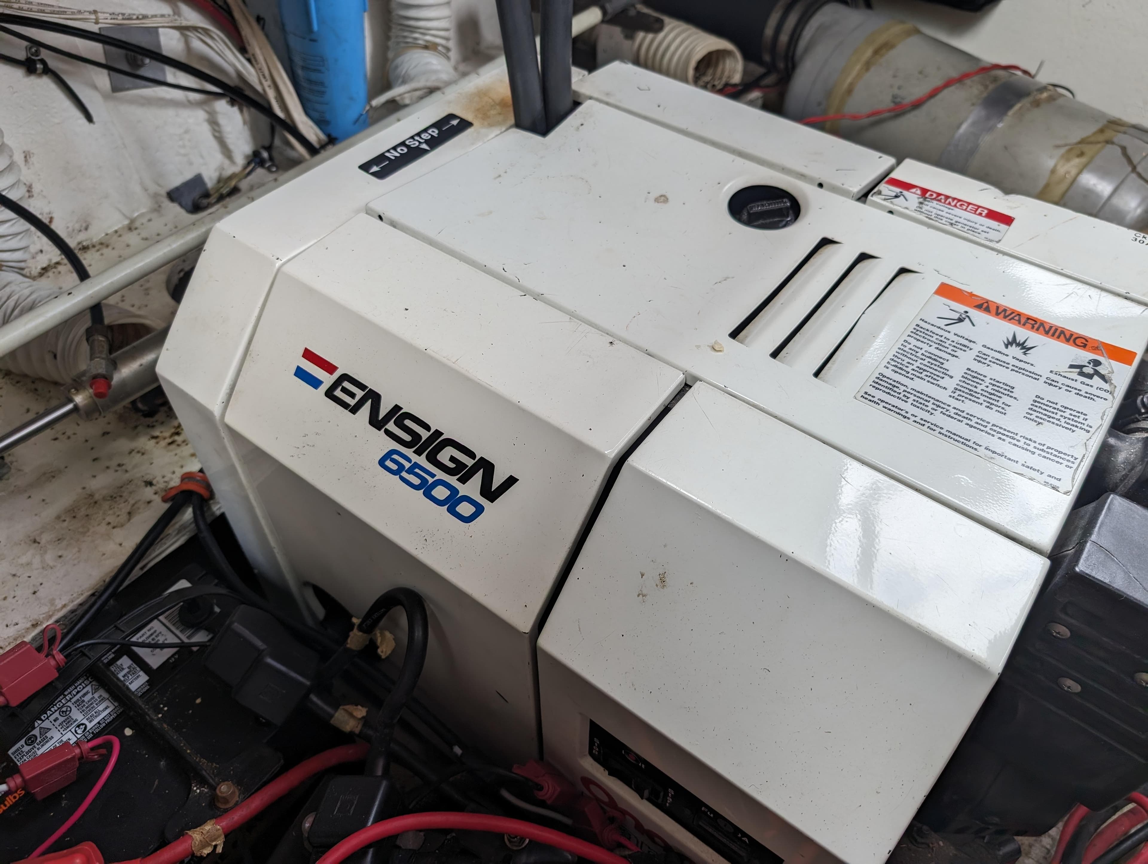 1987 Cruisers 3370 Esprit engine compartment with Ensign 6500 generator.