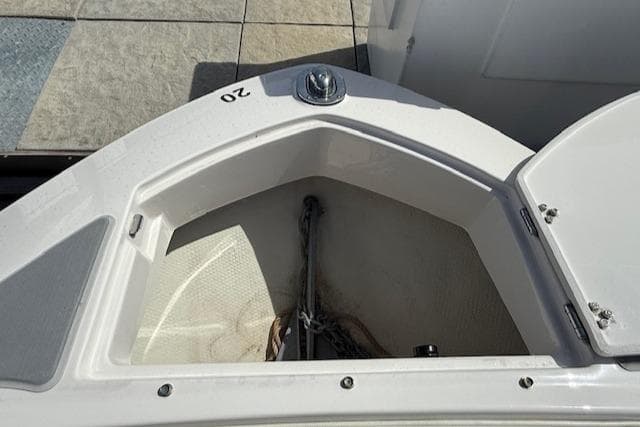 Open anchor compartment on 2020 Regal LS6 Surf boat.