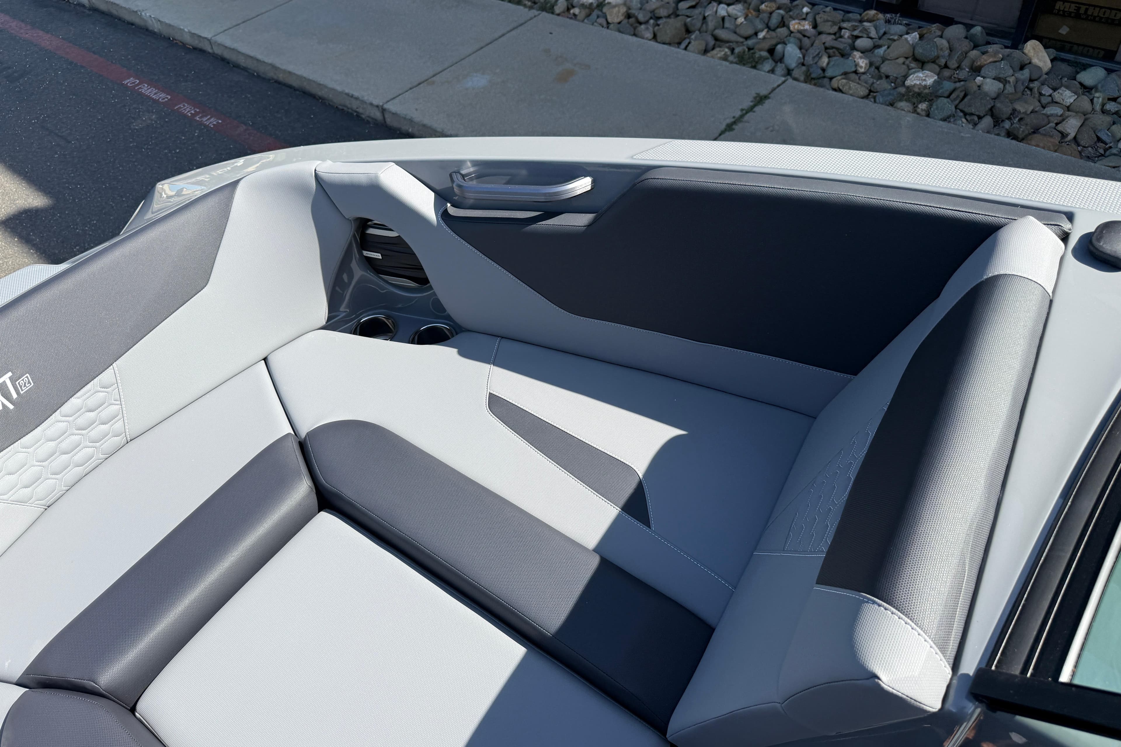 Interior seating of 2026 MasterCraft NXT22 boat, featuring sleek, modern design.