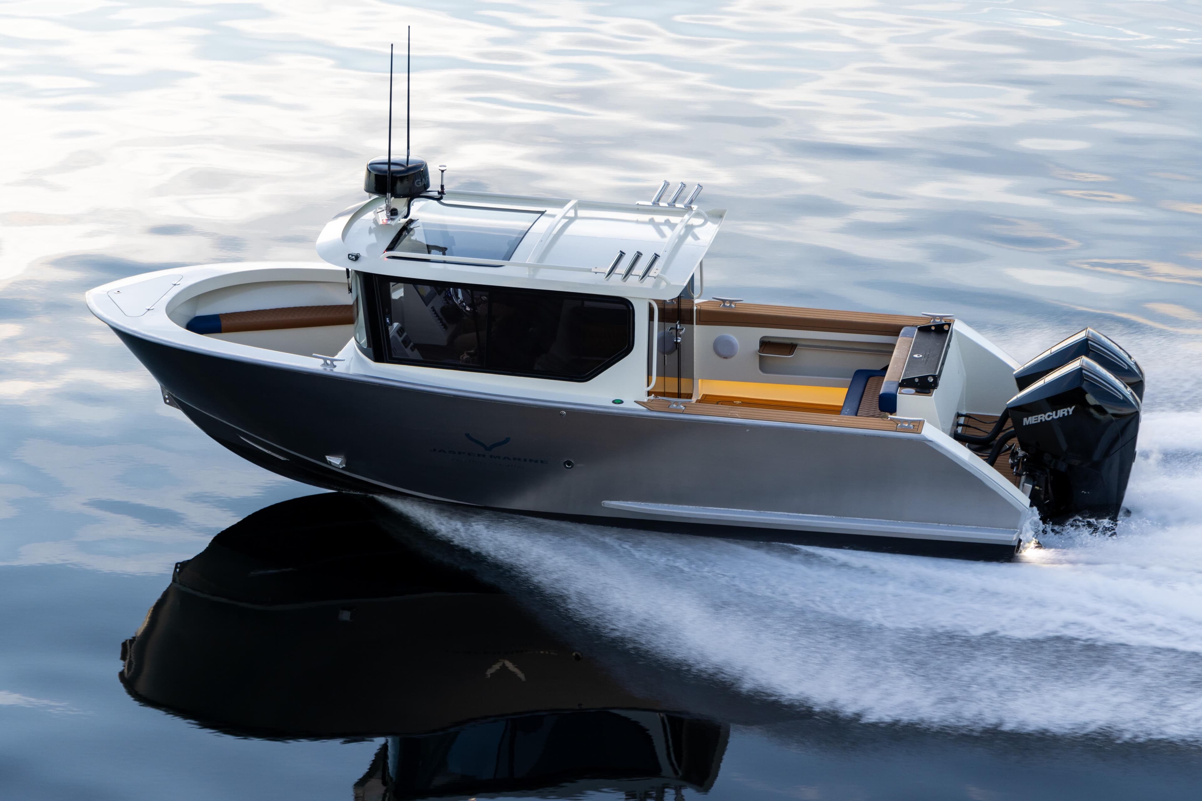 2026 Jasper Marine Defender 22 boat cruising on water, featuring sleek design and powerful Mercury engine.