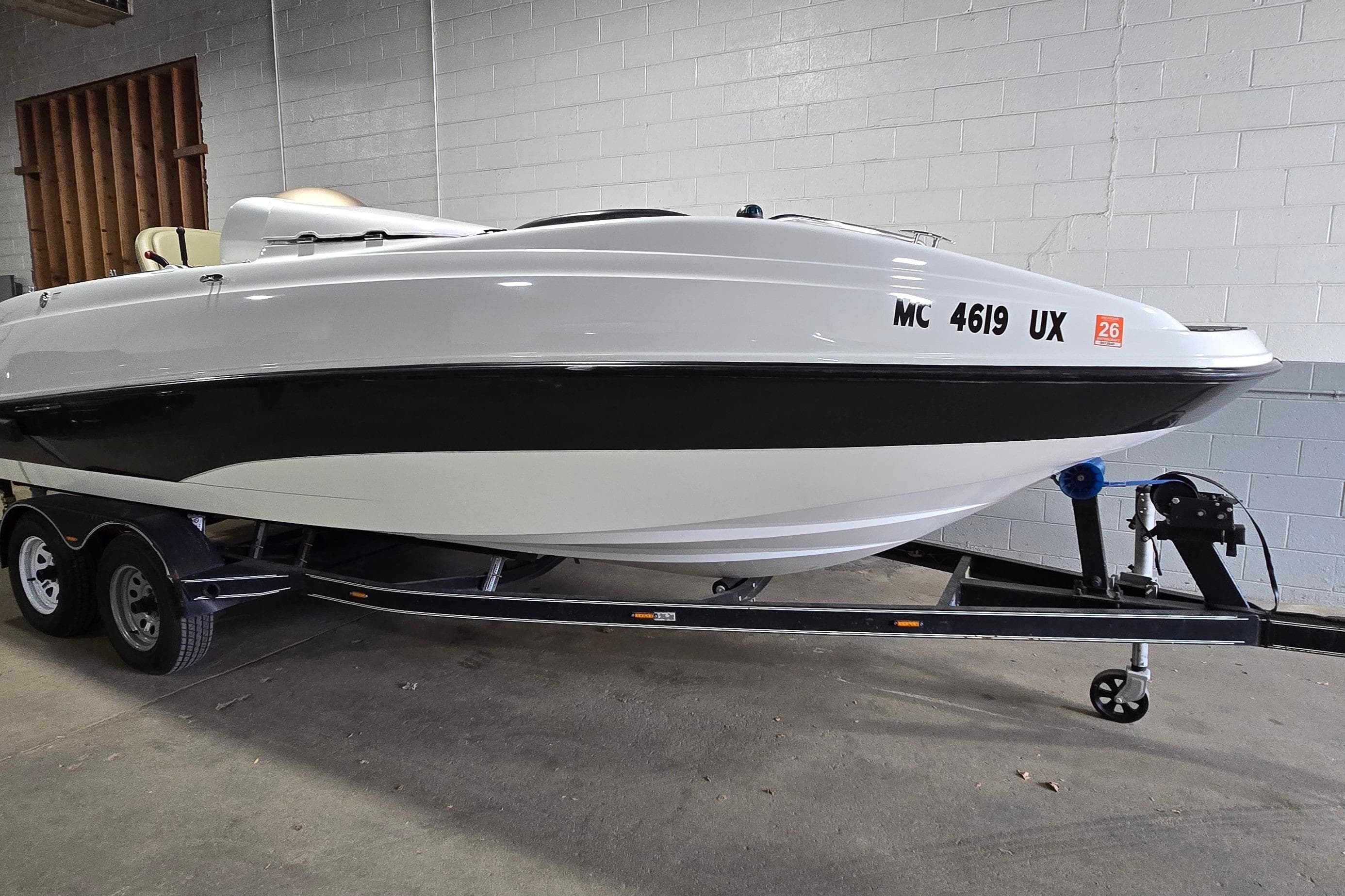 2007 Sea-Doo Islandia SE boat on trailer in indoor storage.