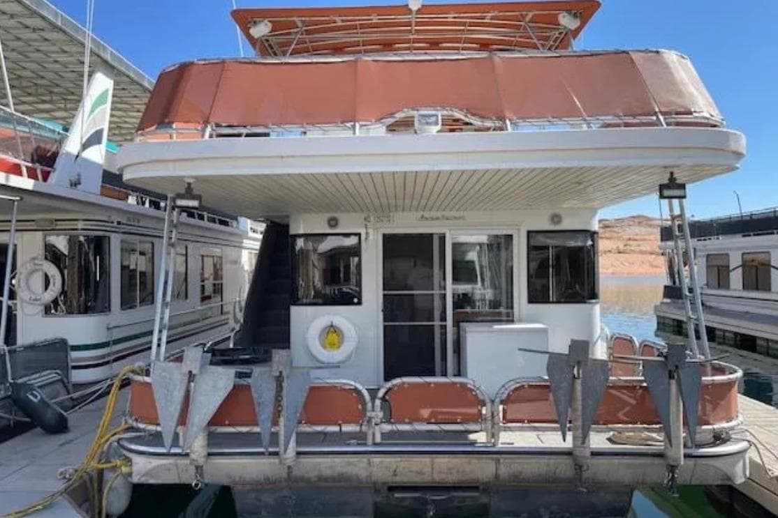 Houseboat docked at marina, American Waterways Sundancer Trip #15, 2007 model.
