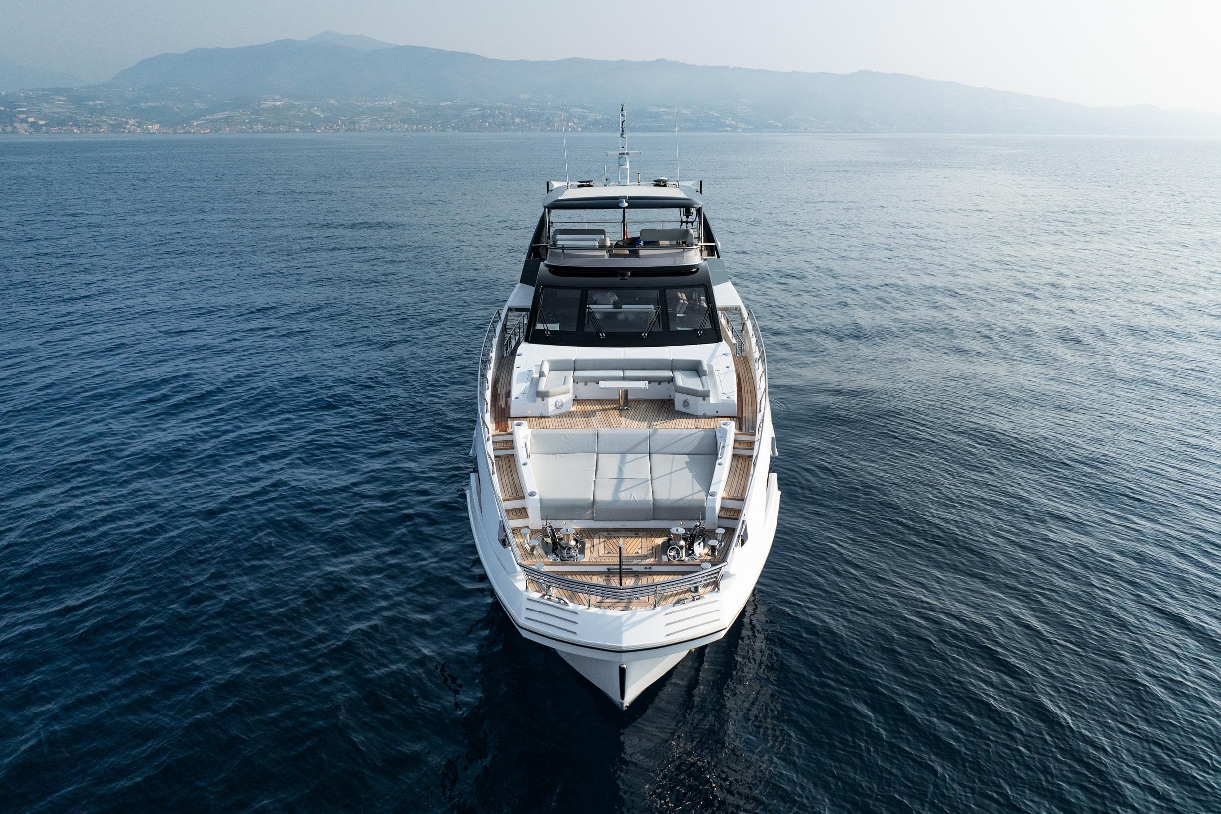 Azimut Grande 27 METRI yacht cruising on open sea, 2020 model.