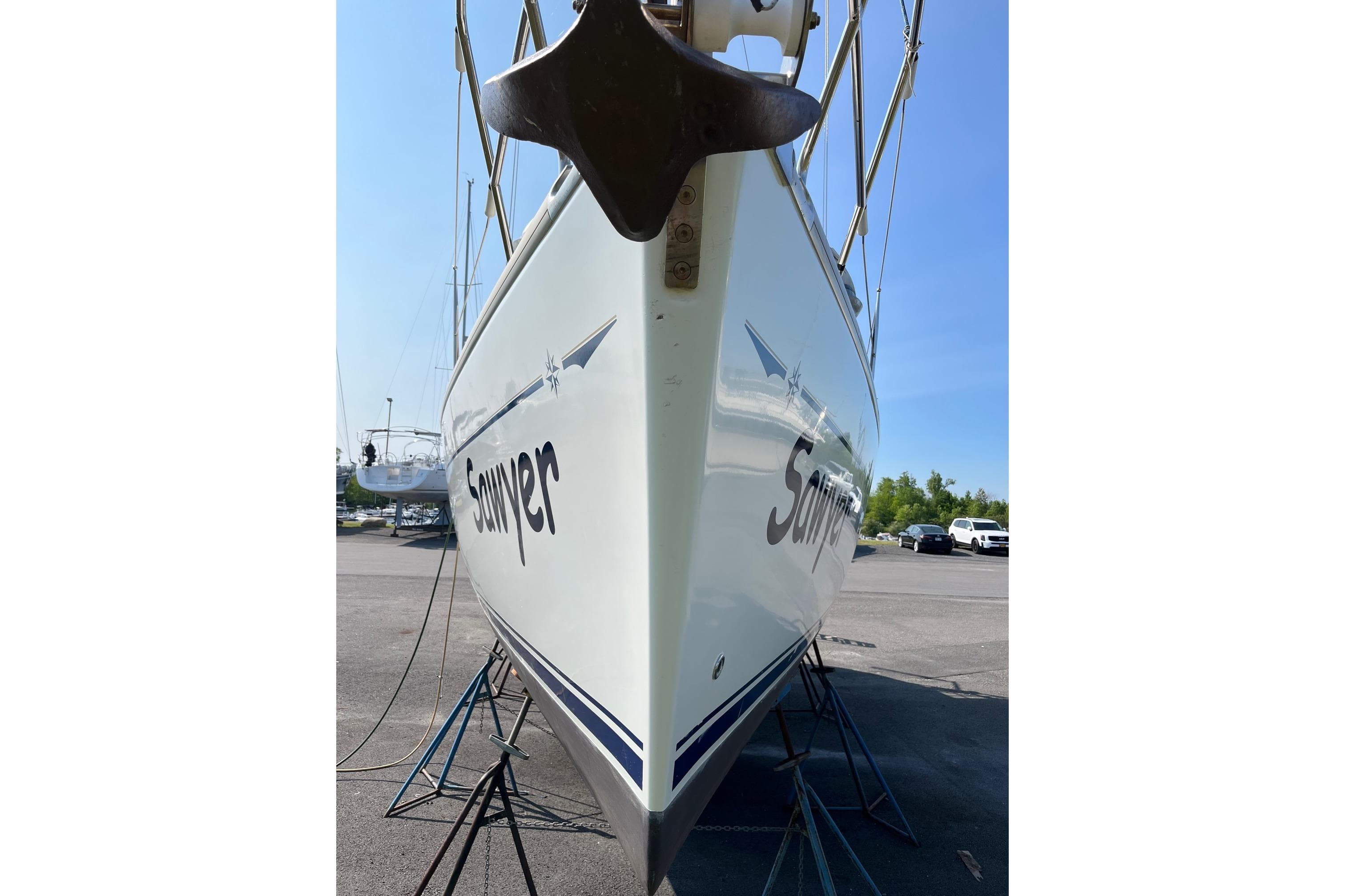 2004 Jeanneau Sun Odyssey 37 sailboat on stands, viewed from the bow.