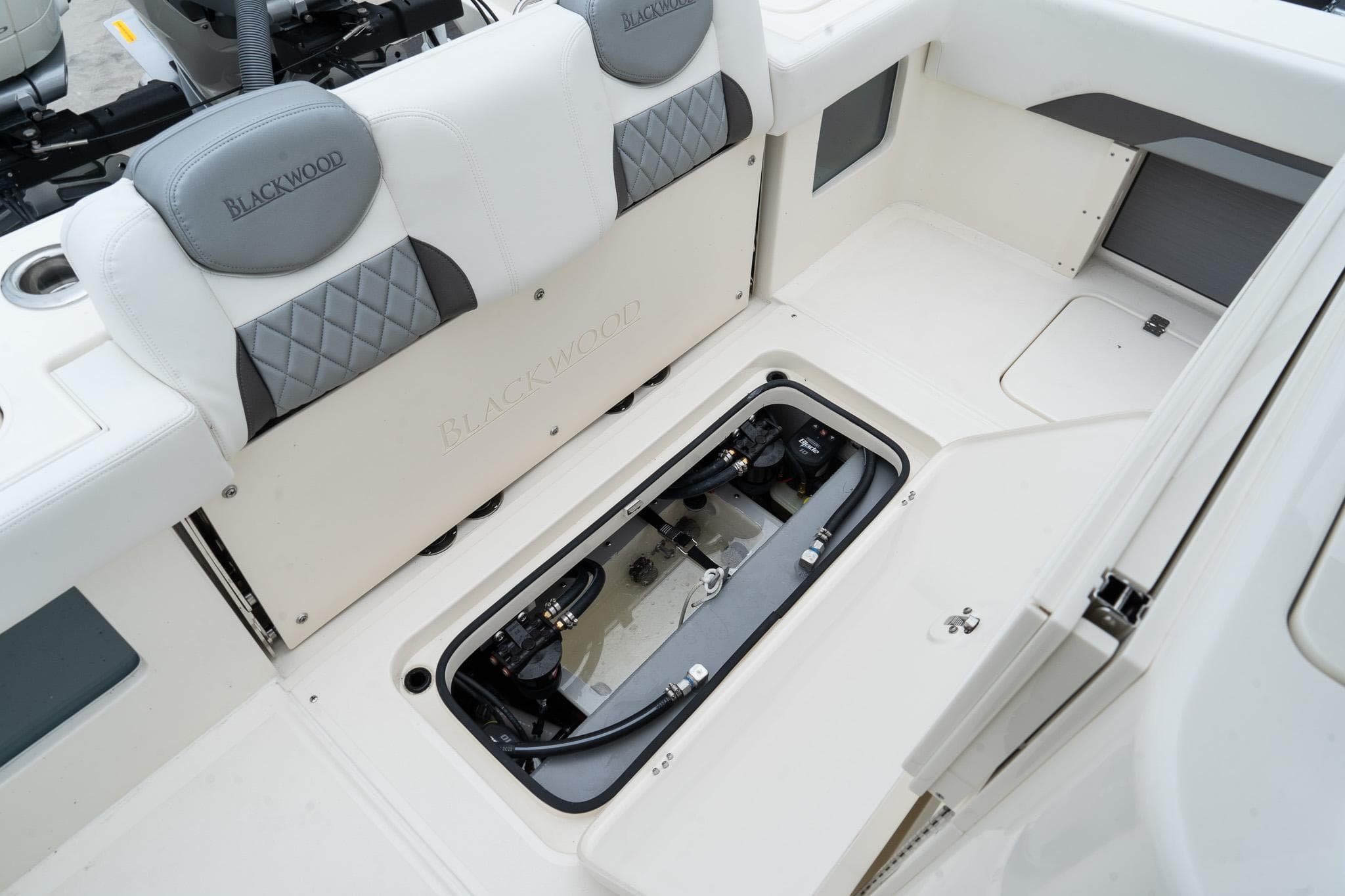 2025 Blackwood 290 OPEN boat interior with open storage compartment.