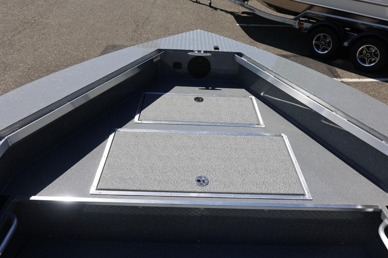 2026 Thunder Jet 209 Rush OT boat deck with storage compartments.