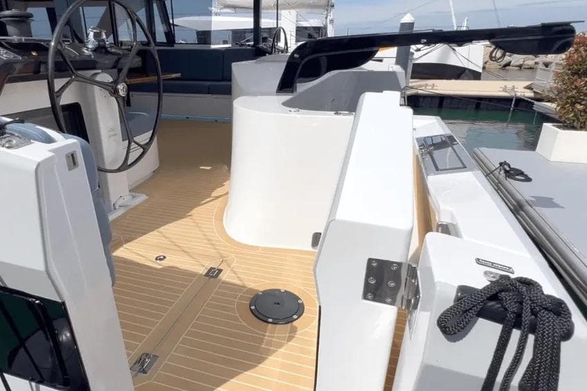 2025 HH Catamarans HH44 yacht cockpit with modern steering and sleek design.
