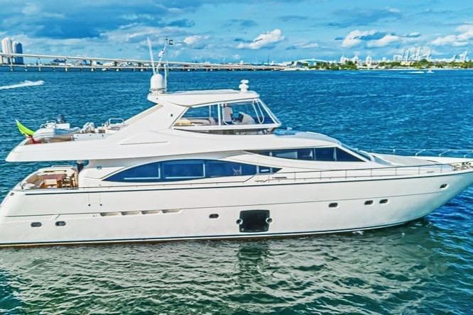 Luxury 2011 Ferretti Yachts 830 cruising on blue waters under a clear sky.