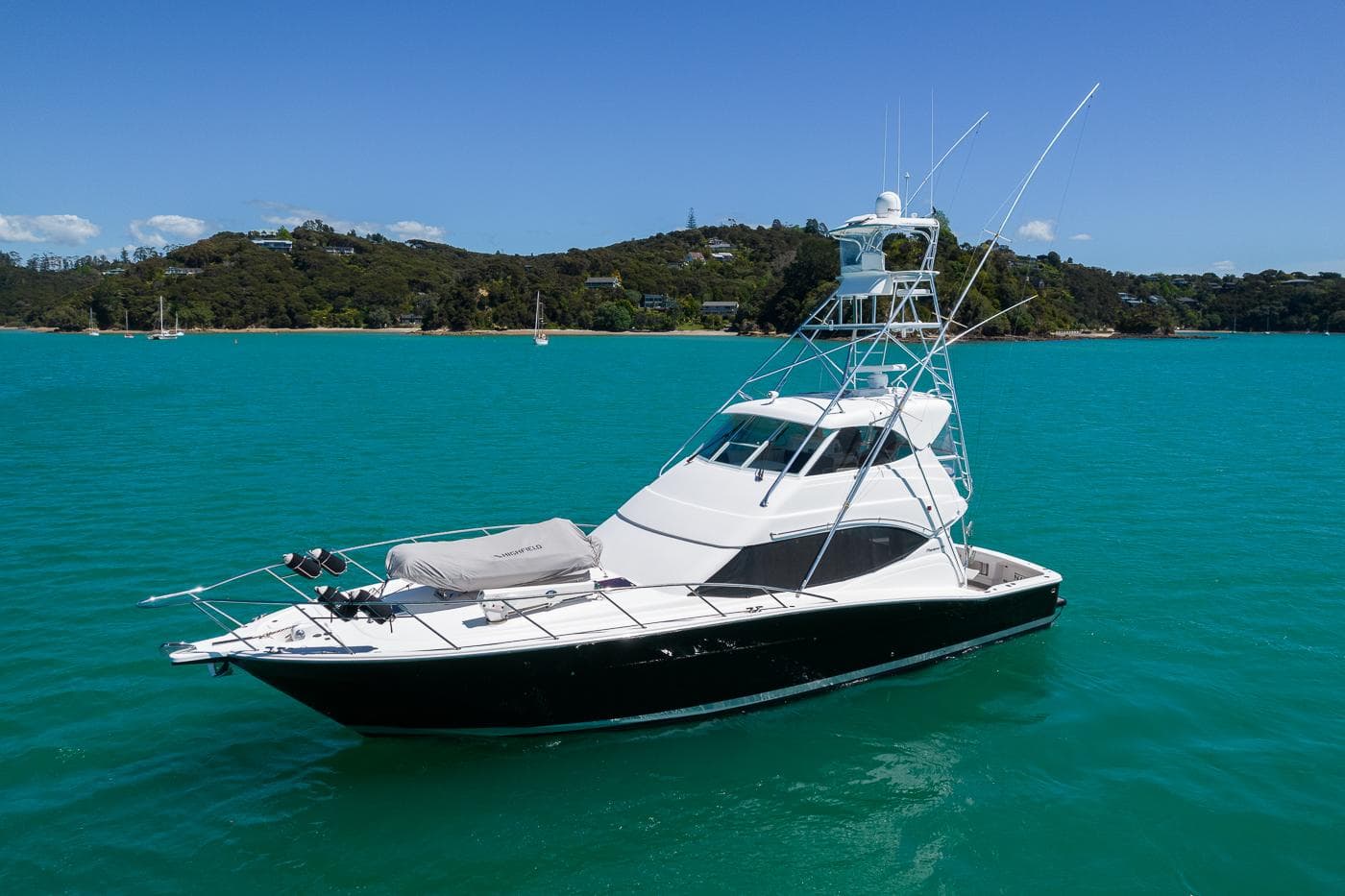 2009 Maritimo 500 Offshore yacht on turquoise water, scenic background.