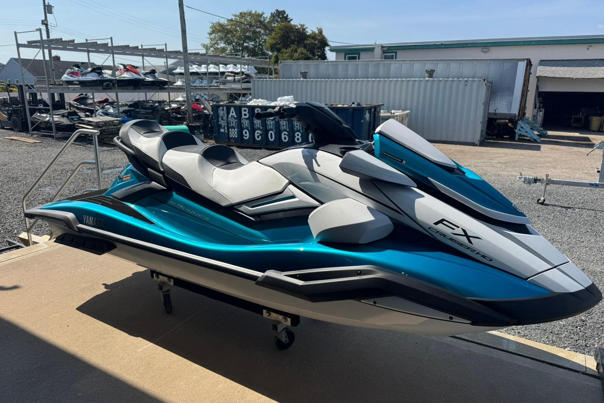 2026 Yamaha WaveRunner FX Cruiser HO in a showroom, showcasing sleek design and modern features.