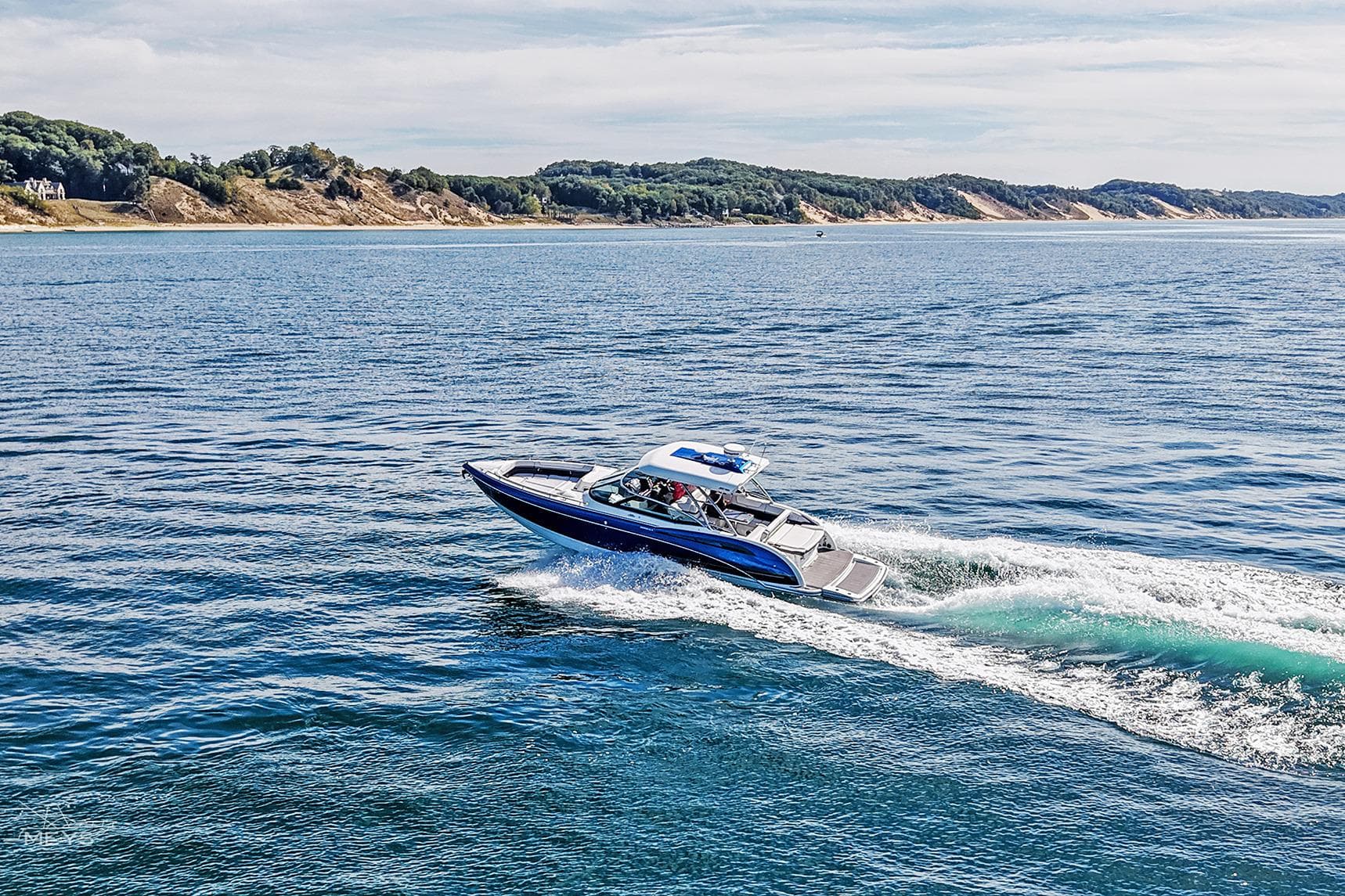 2018 Formula 350 FX Crossover Bowrider cruising on scenic coastal waters.