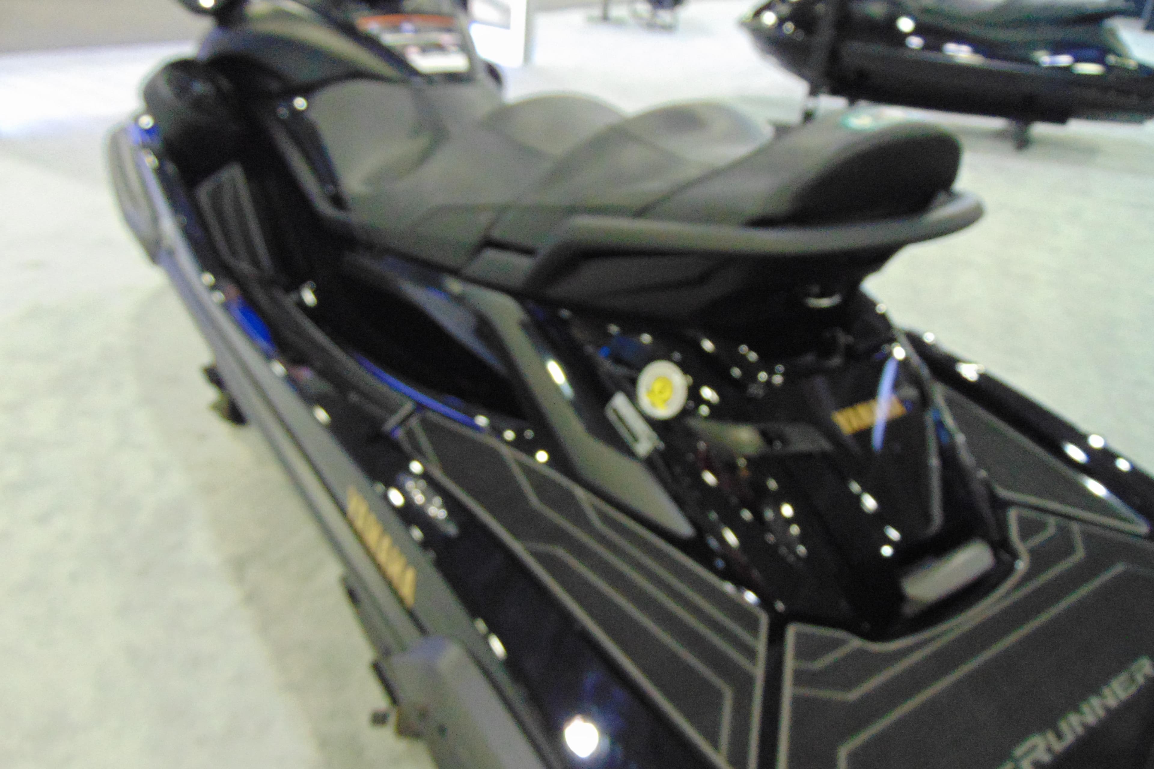 2026 Yamaha WaveRunner FX Limited SVHO, sleek black design, showcased indoors.