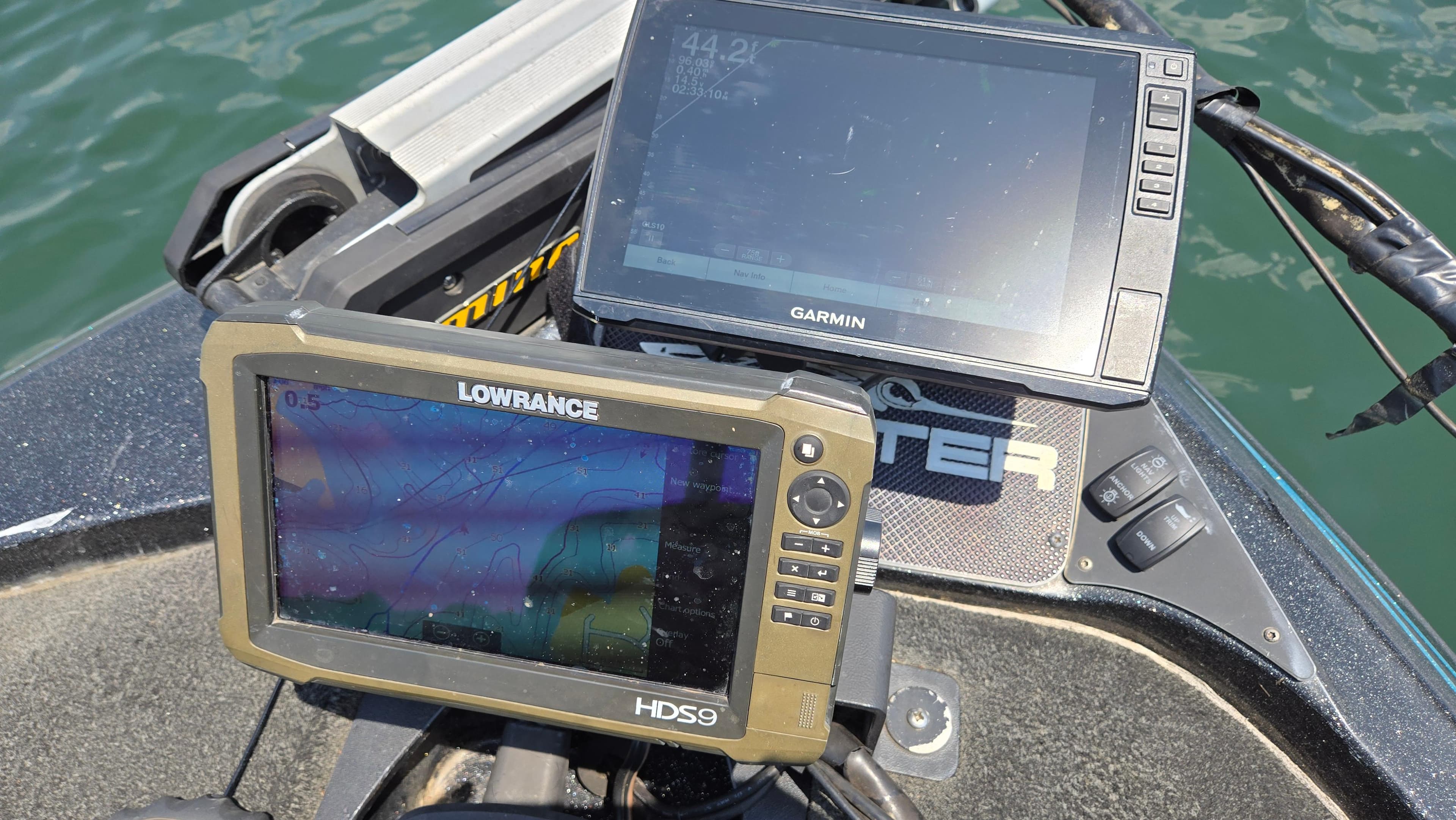 Fishfinder and GPS units on a 2017 Skeeter ZX 250 boat dashboard.