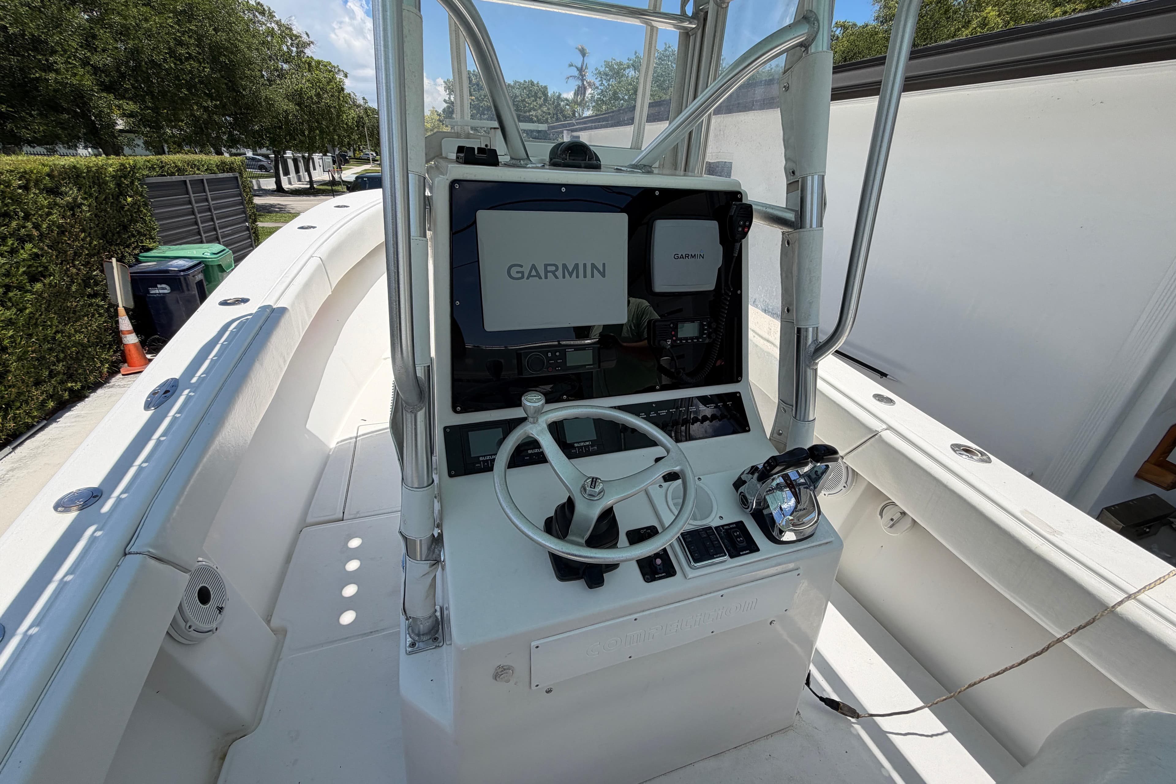 Center console of a 2005 Competition 25 boat with Garmin navigation system.