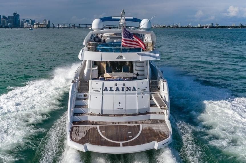 Sunseeker 82 Yacht cruising in open water, rear view, 2003 model.