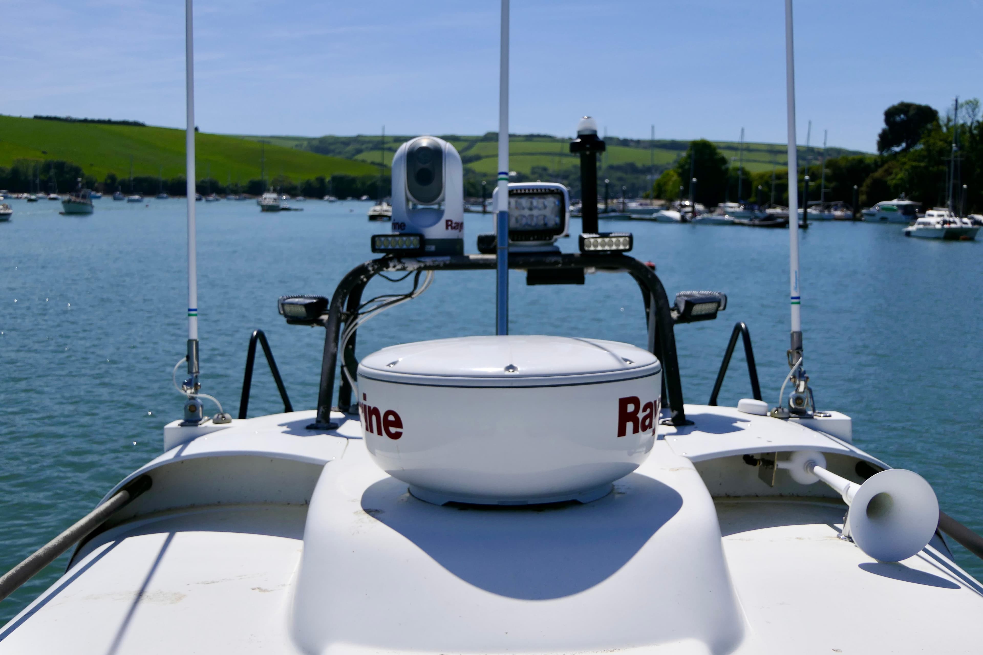 Viking Norsafe Munin S-1200 boat with radar equipment on a sunny day.