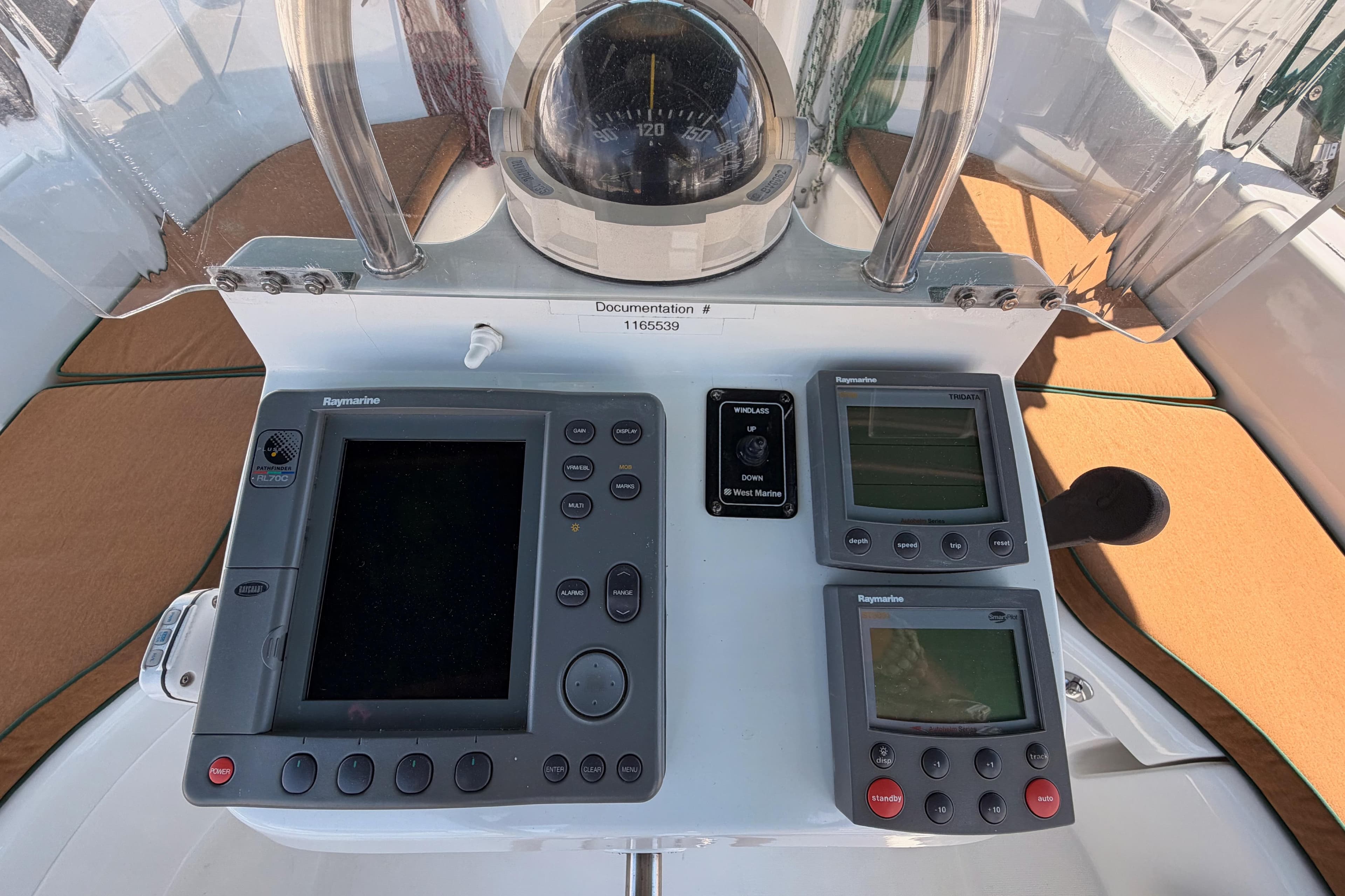 Control panel of a 2005 Beneteau Oceanis Clipper 423 sailboat with navigation instruments.