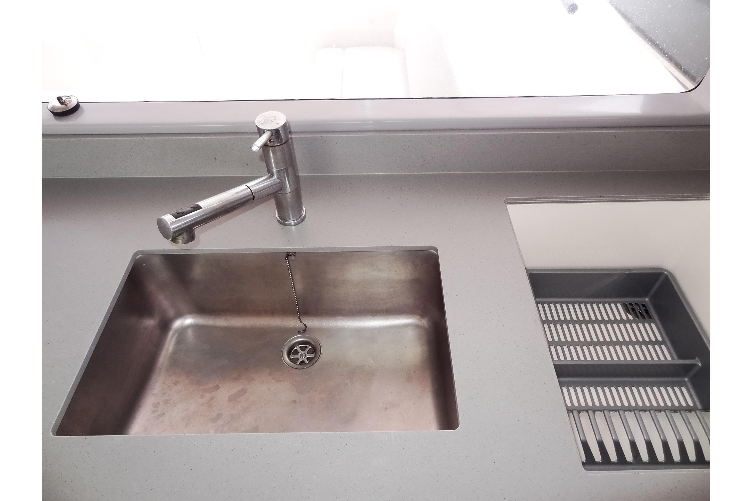 Modern kitchen sink and faucet in 2020 Leopard 45 yacht.