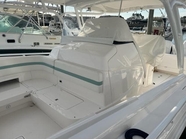 2018 Intrepid 375 Walkaround boat interior with seating and storage compartments.